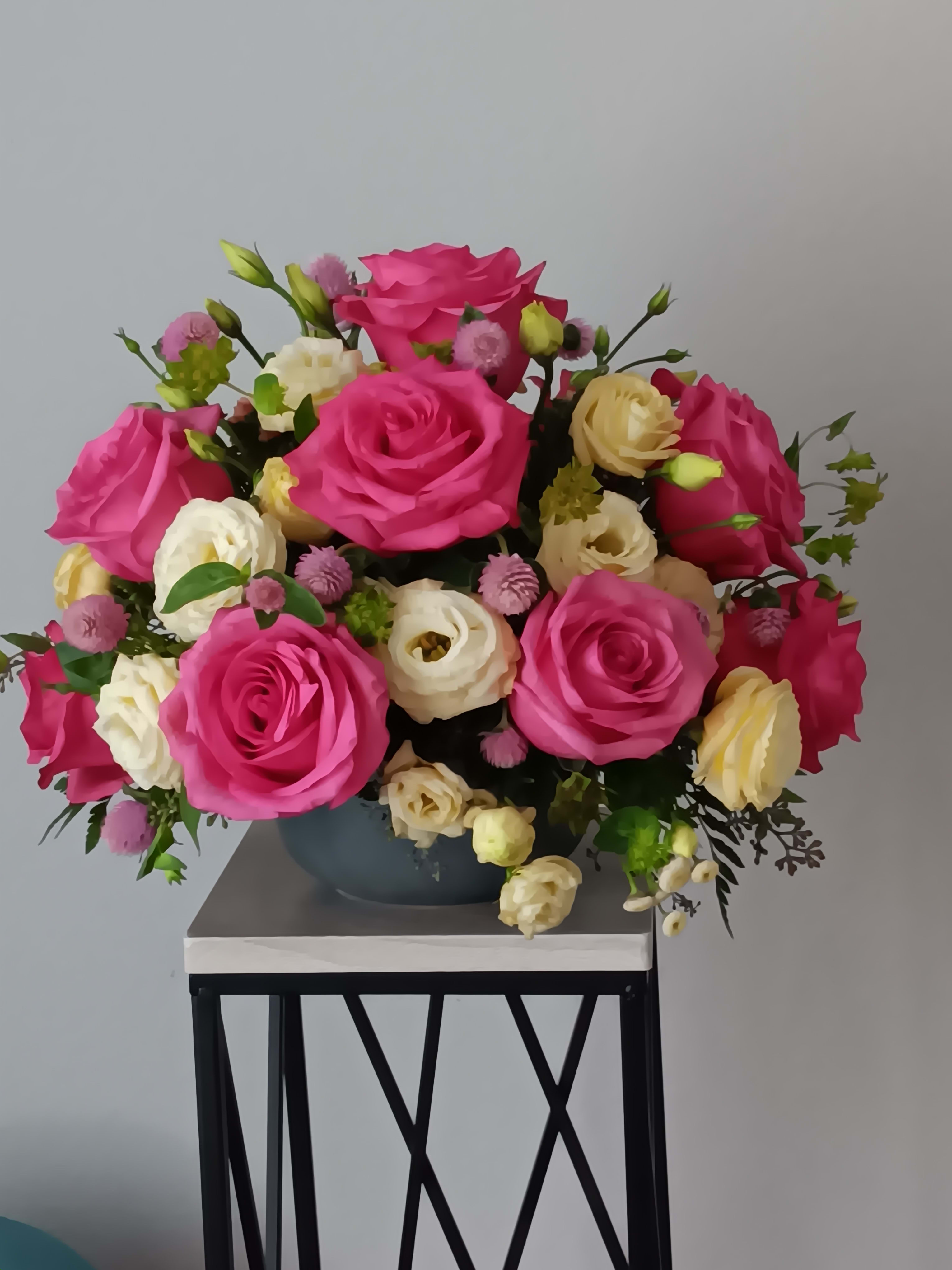 You're Precious Bouquet - Blushing shades of pink blooms are nestled in lush greens to charm anyone's day. This bouquet is abundant with a classic assortment of pretty florals – roses, lisianthus and chrisanthemums to name a few.