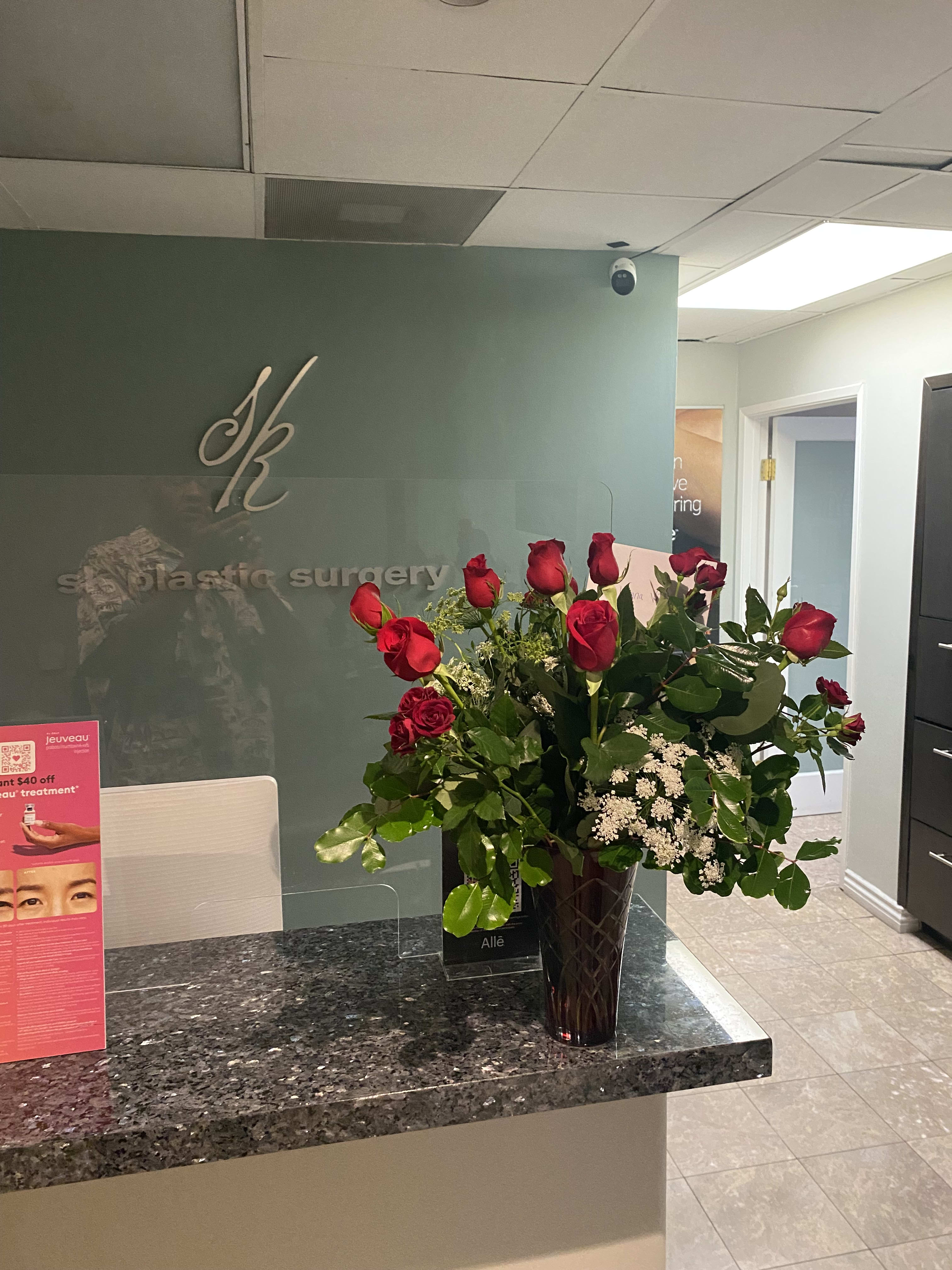 LOVELY RED ROSE BOUQUET - SEND A WONDERFUL RED ROSE BOUQUET-  SURE TO BRIGHTEN UP ANY ONES DAY. DISPLAYED IN A BEAUTIFUL RED VASE.