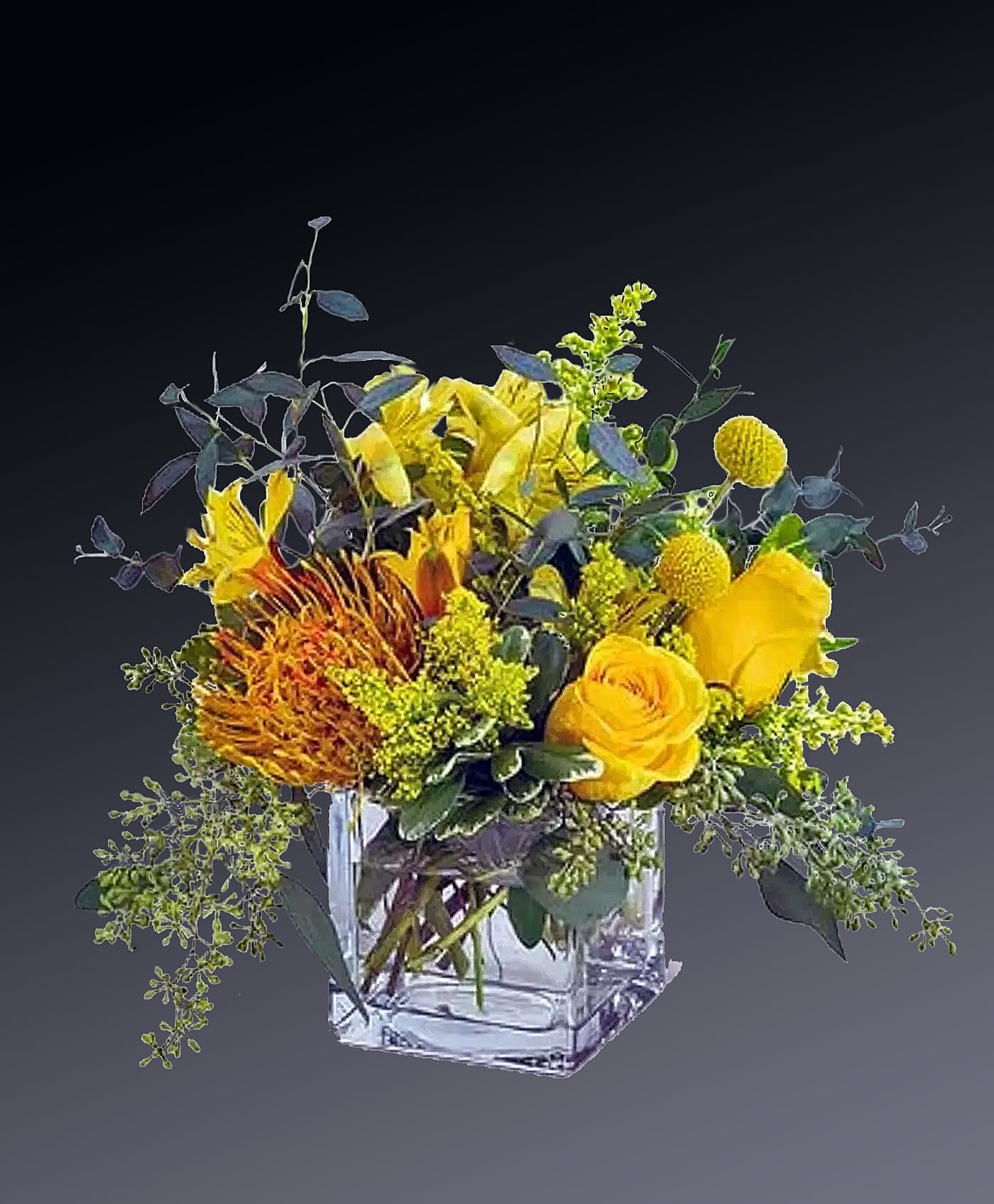 summer Fling - You can't help but smile at these bright, beautiful blooms! Like a ray of sunshine, this golden mix of roses and tropical in a square cube, will put anyone in a marvelous mood.