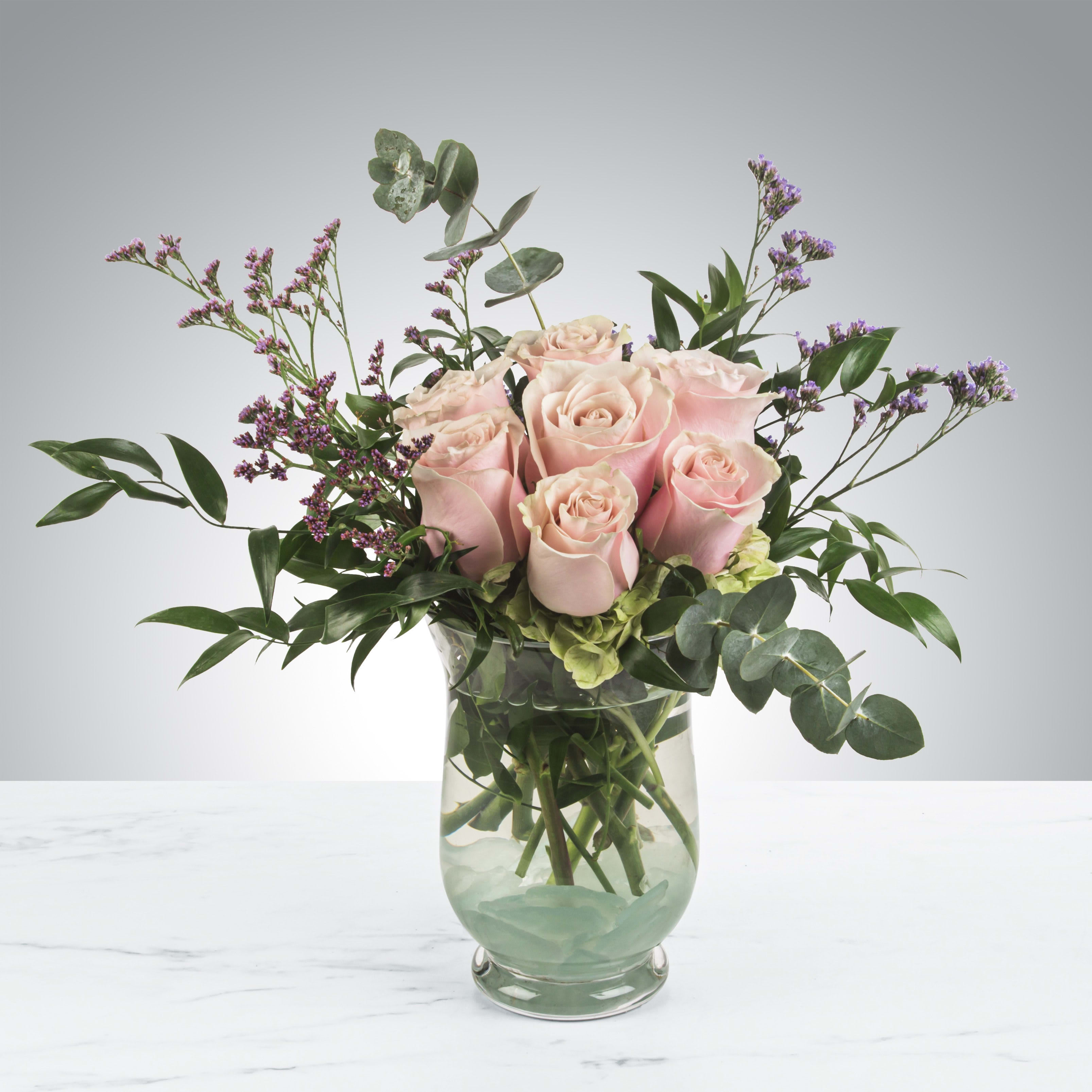 Daydreaming by BloomNation™ - Blush roses with a variety of greenery and eucalyptus come together for a lovely arrangement. A stylish and sweet way to dress up any space, send this arrangement for Mothers Day, Sister's Day, or Women's Day.    APPROXIMATE DIMENSIONS: 15&quot; W x 10&quot; H