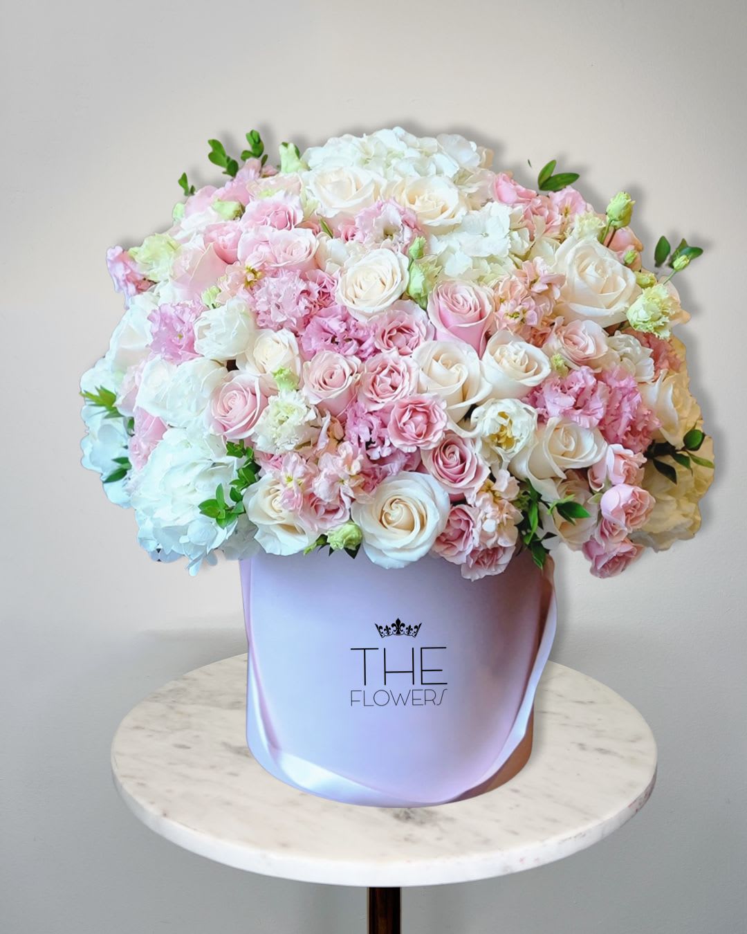 Best Wishes - Delicate and light arrangement in a luxurious velvet box with white roses, tulips, light pink baby roses, slightly touched with greenery symbolizes the strongest, purest and strongest feelings and best wishes. 'The Flowers'' company is ready to offer compositions that perfectly express your attitude and allows you to convey not only your thoughts and feelings, but also make the day truly festive