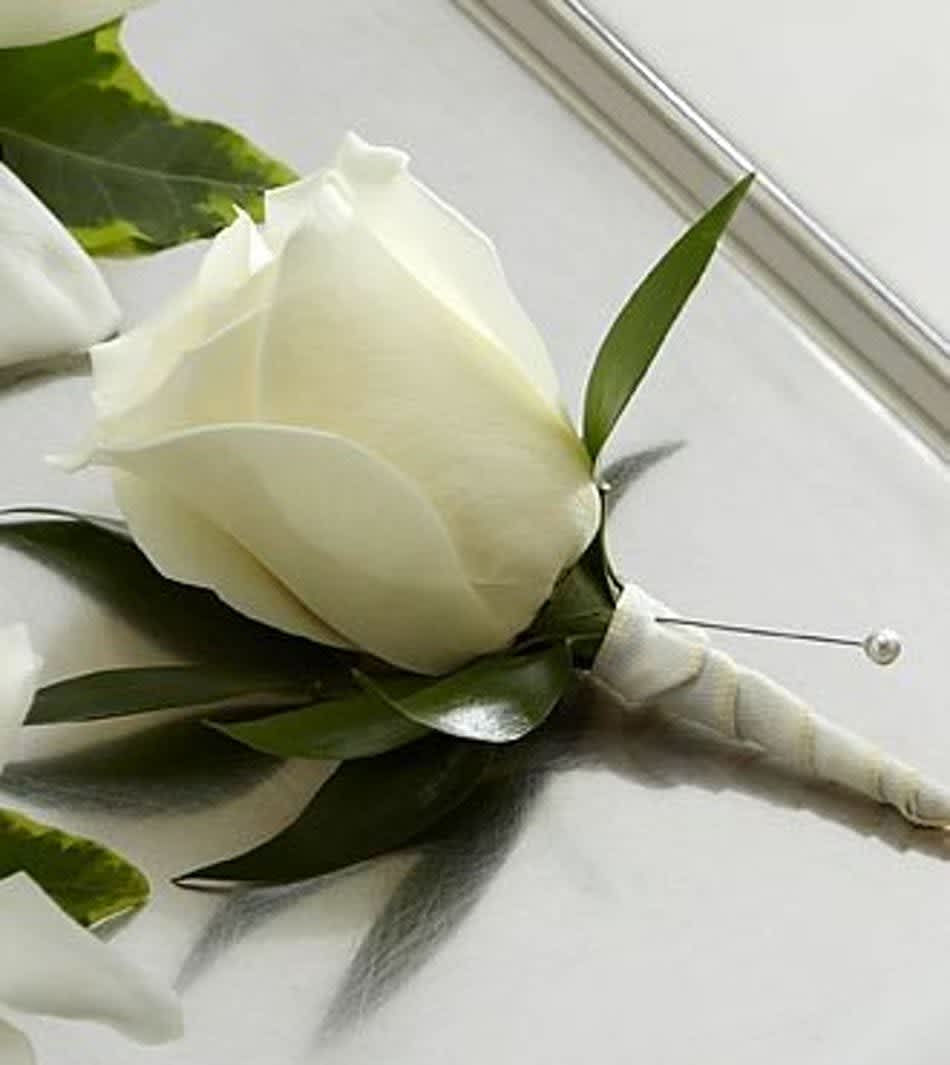 Aspen Boutonnière ( Please allow 3 business days for pick up) - Designed after the snow covered peaks of the rookies this white rose Boutonniere looks good on everyone's Lapel.   NOTE Please allow 3 business days for pick up. A Moment maker will call you to confirm pick up date and time in 24 hours!