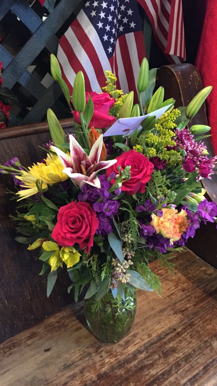 Designer Choice (Over the Rainbow)  - A colorful mix, designers choice. Including roses, gerber daisy and much more! Let us help you celebrate a special occasion 
