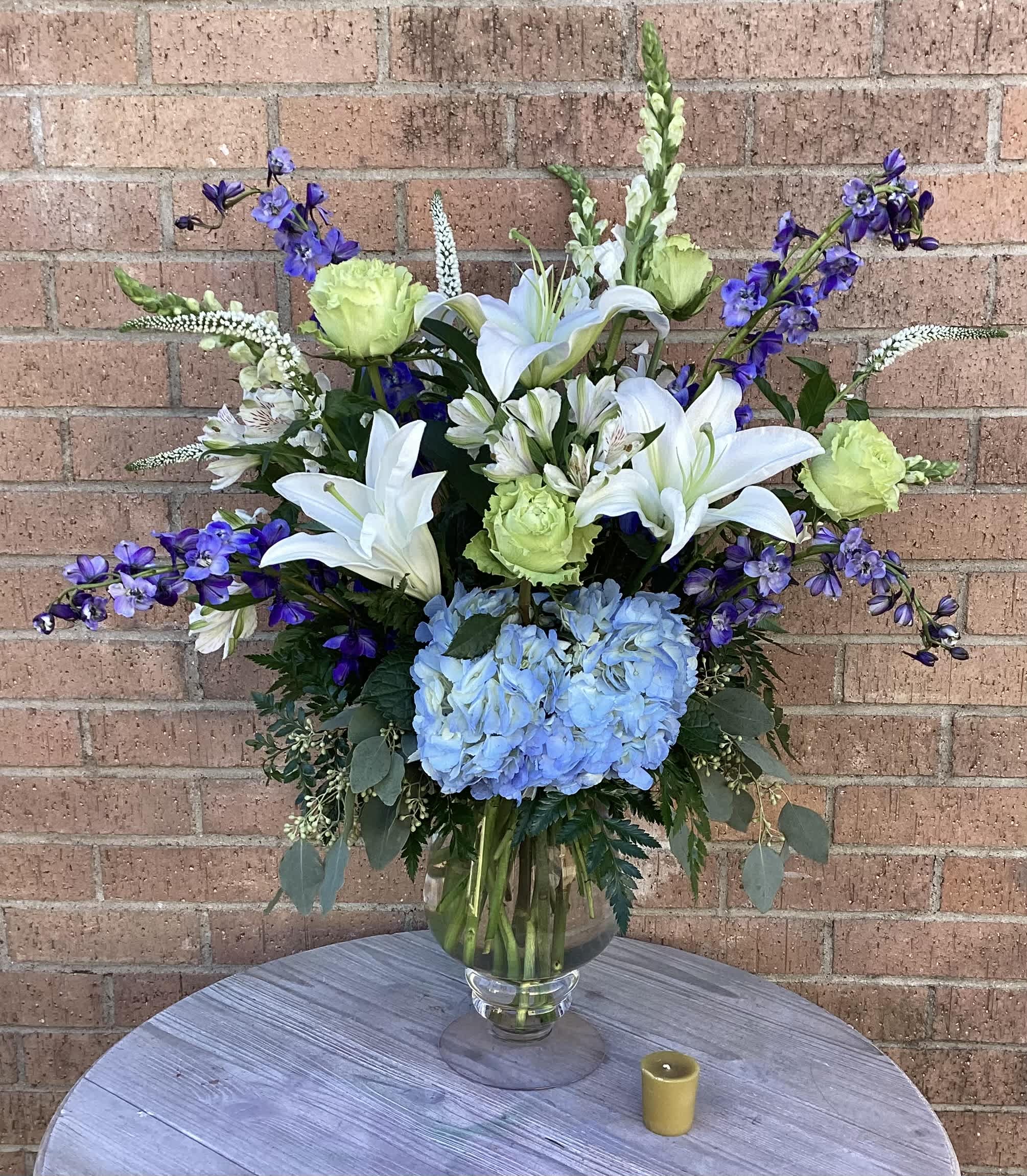 Whimsical Blooms - This arrangement brings fresh beauty and whimsical blue and white flowers to your special recipient. 