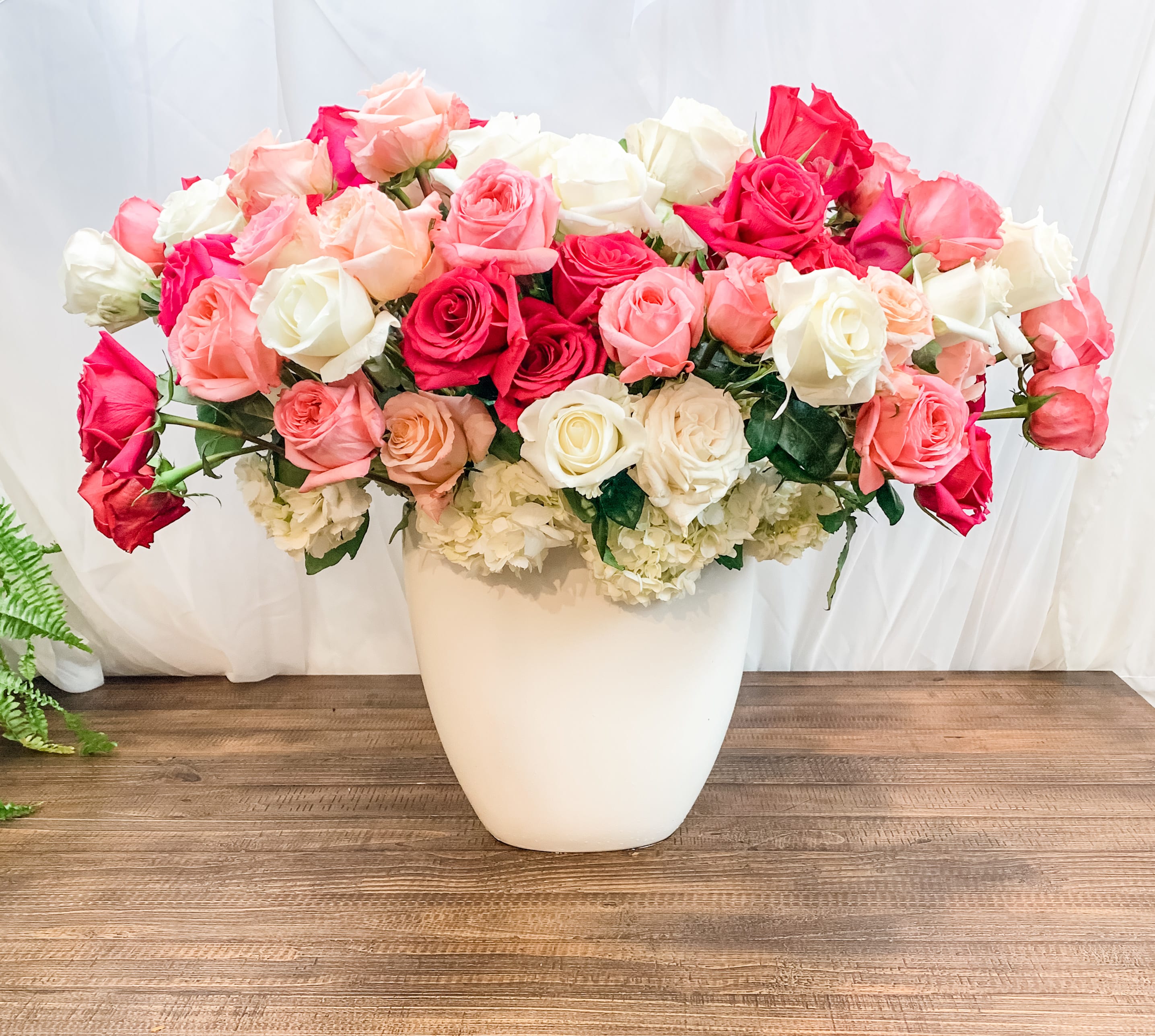 Forever in Love - Large, luscious arrangement of premium white and pink roses. Vase may vary depending on availability