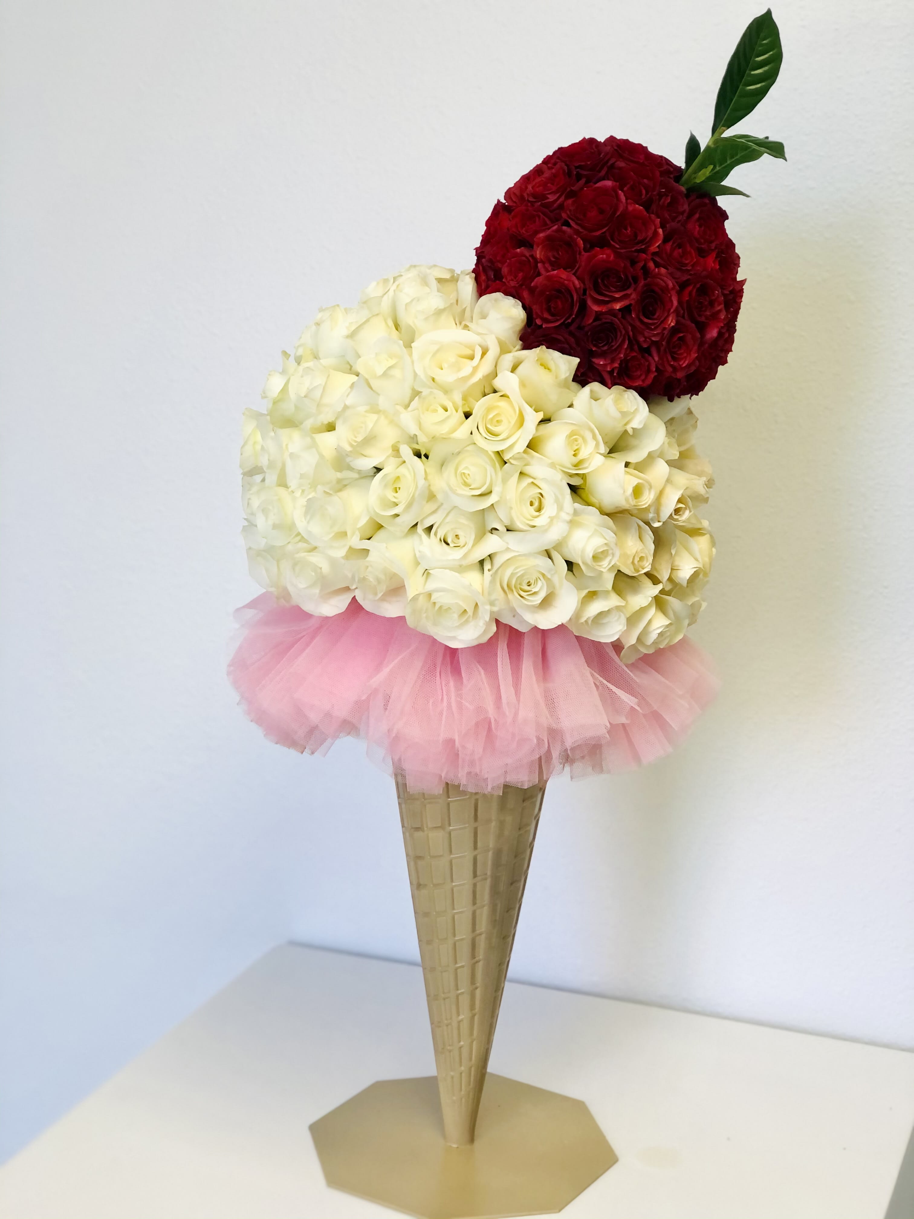 Sweetest Surprise  - An 18” Ice cream cone with a scoop of ice cream made up to 100 roses!  Don’t forget the cherry on top!  Does the recipient have a favorite ice cream flavor?  Message us and we will change the rose color accordingly. 