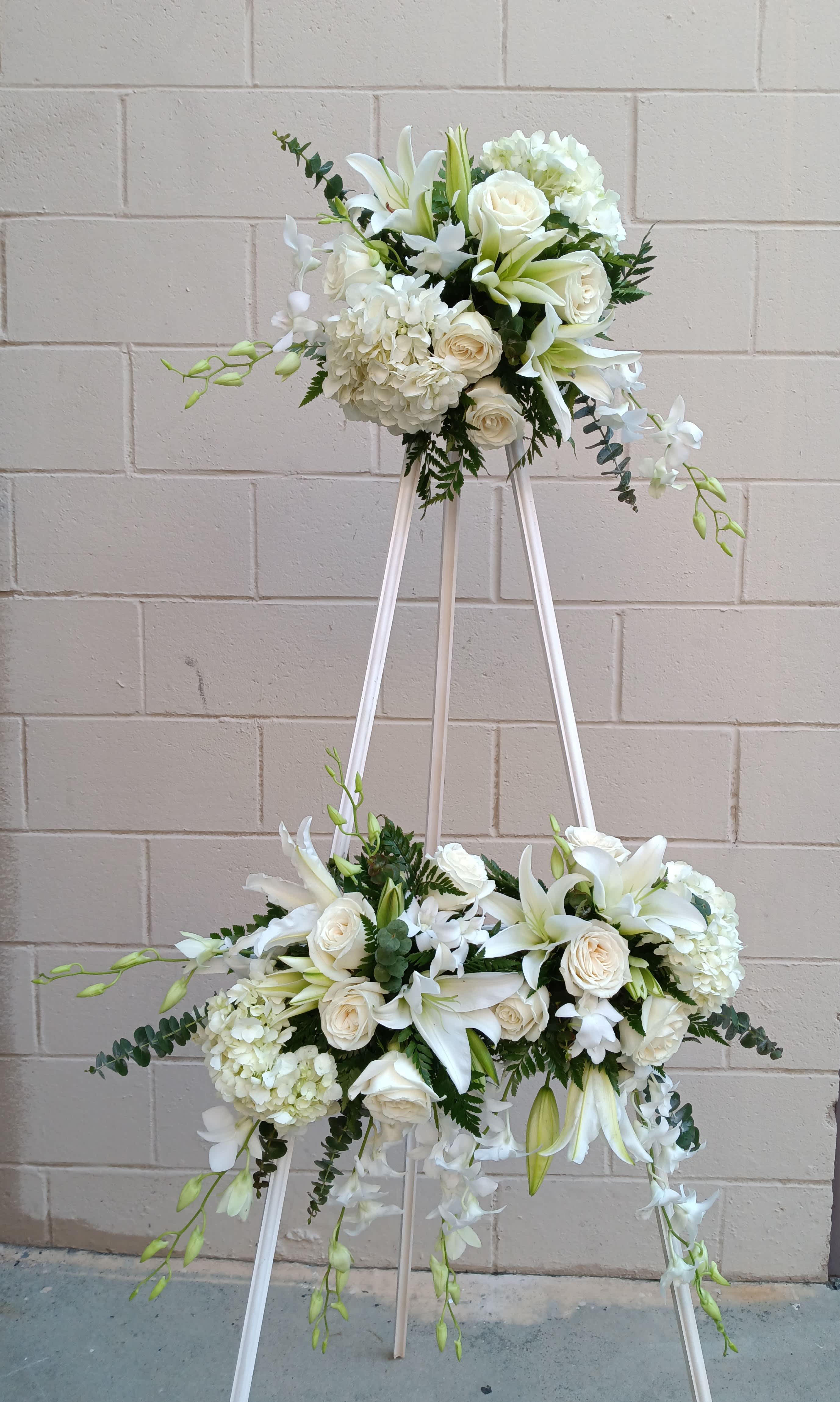 Memorial Picture Frame  - An easel decorated with beautiful blooms that frame a photo   holds picture approximately 11x15 