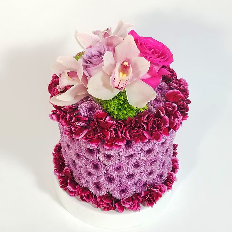 Sweet cherry pie - Send That Especial Someone a Fat Free Flower Cake. Made with mums, Cymbidium Orchids, Roses, and Floral Fillers.   There is a window off 24 hours to fulfill these order 