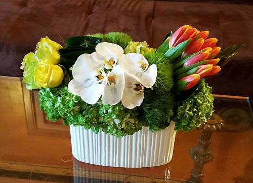Spring Love # EF101 - Tulips, Roses, Green Hydrangea, Orchid  Arranged elegantly in a designer ceramic vase. (maybe your choice of colors)  (exact container not available ) we use similar as possible 