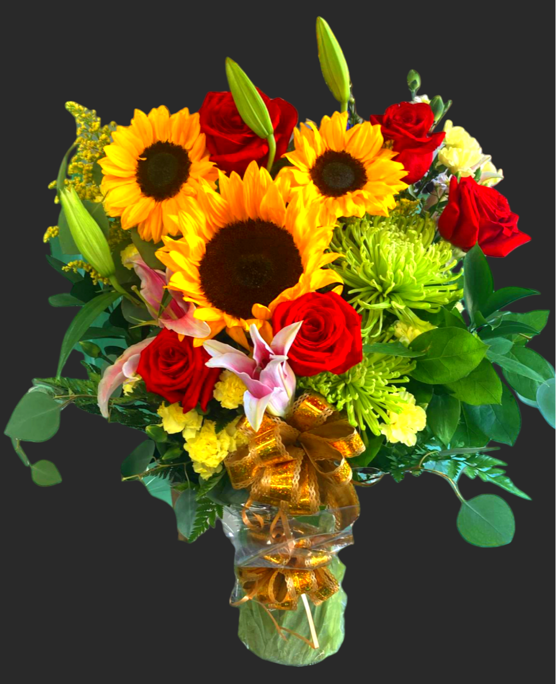 Large spring floral vase centerpiece - nice and large floral centerpiece with spring mixed flowers. A mix of sunflowers, green spider mums, yellow mini carnations, red roses, yellow solidago, pink lillies and greenery in a nice glass vase.