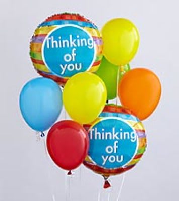 Balloon Bouquet - Festive balloon bouquet including four mylar balloons and six latex balloons attached to a weight.