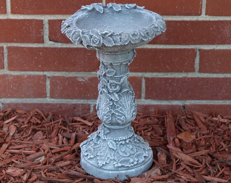 Concrete Rose Pedistal Birdbath - Concrete Birdbath stand approx 11” tall. Solid concrete concrete can be used inside or out. This birdbath can be sold as seen in photo, if you would like to add fresh or silk florals select the deluxe or premium version.