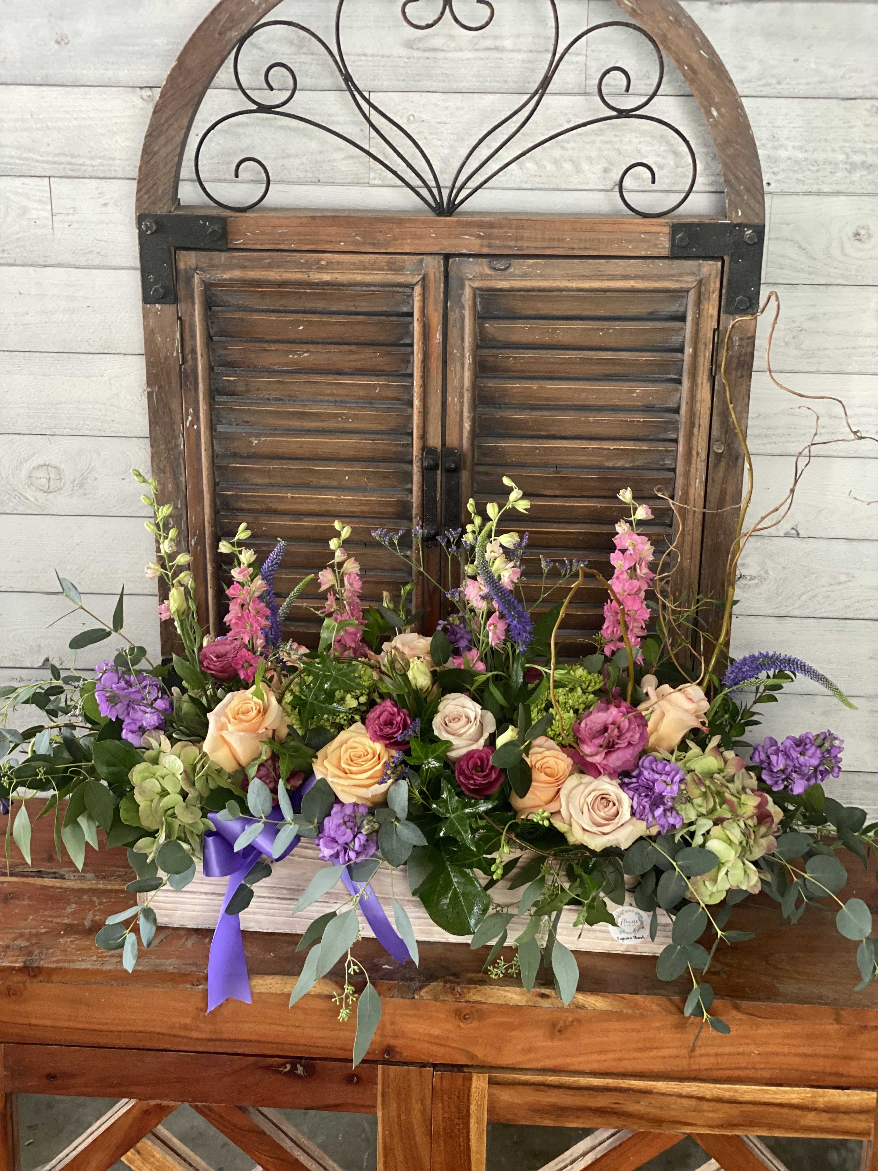 Laguna Beach's Garden Bouquet Laguna Beach's Garden Bouquet - 3' Long arrangement, with pastel multicolor flowers.