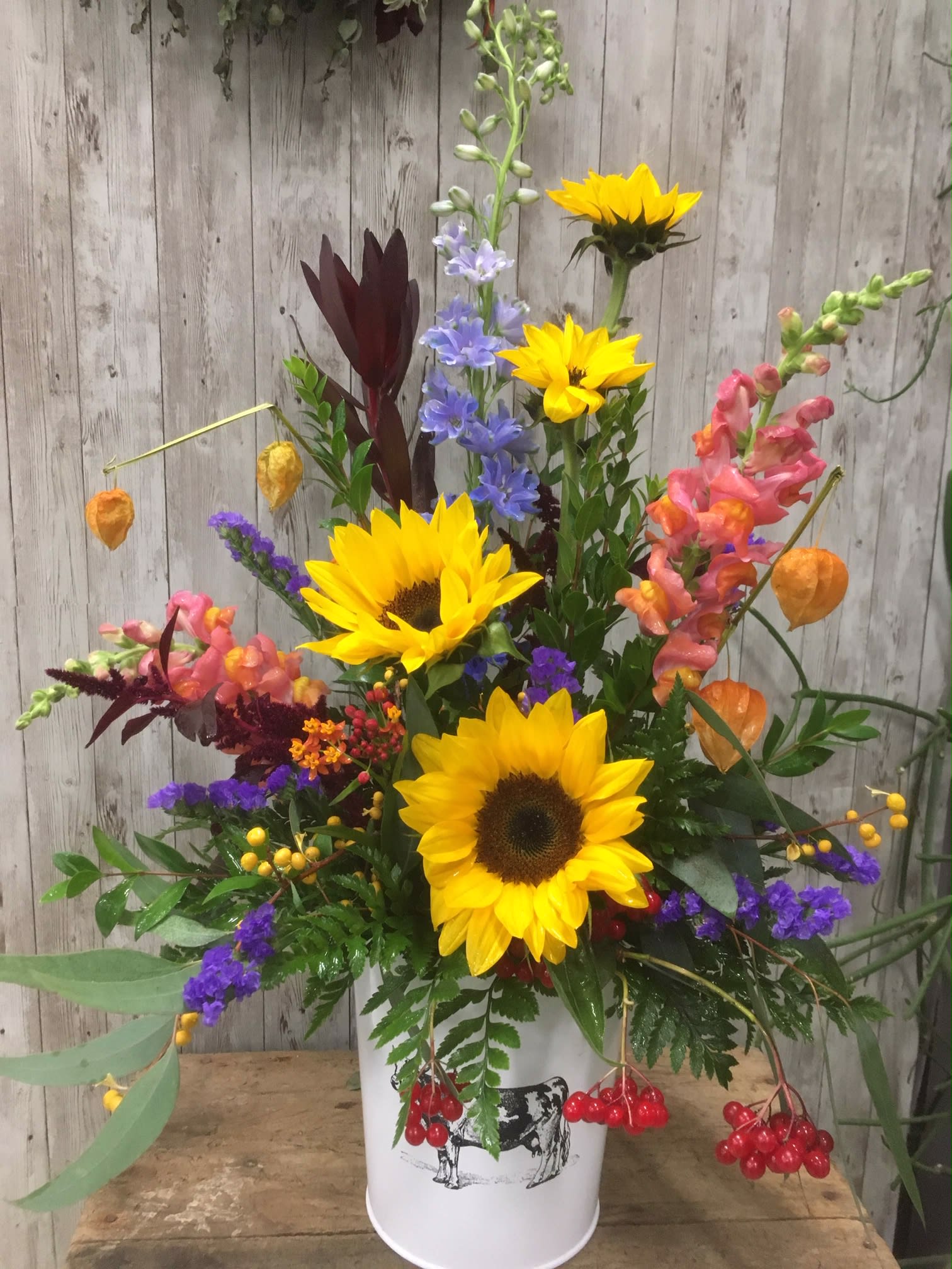 summer time country feel - snapdragons, sunflowers, and dephinium