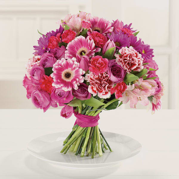 Heavenly Hand-Tied Heavenly Hand-Tied - A feminine mix of bright pink blooms! (20"H X 17"W) **this bouquet will be delivered in a wet wrap for a temporary water source until recipient can put the bouquet into a vase**
