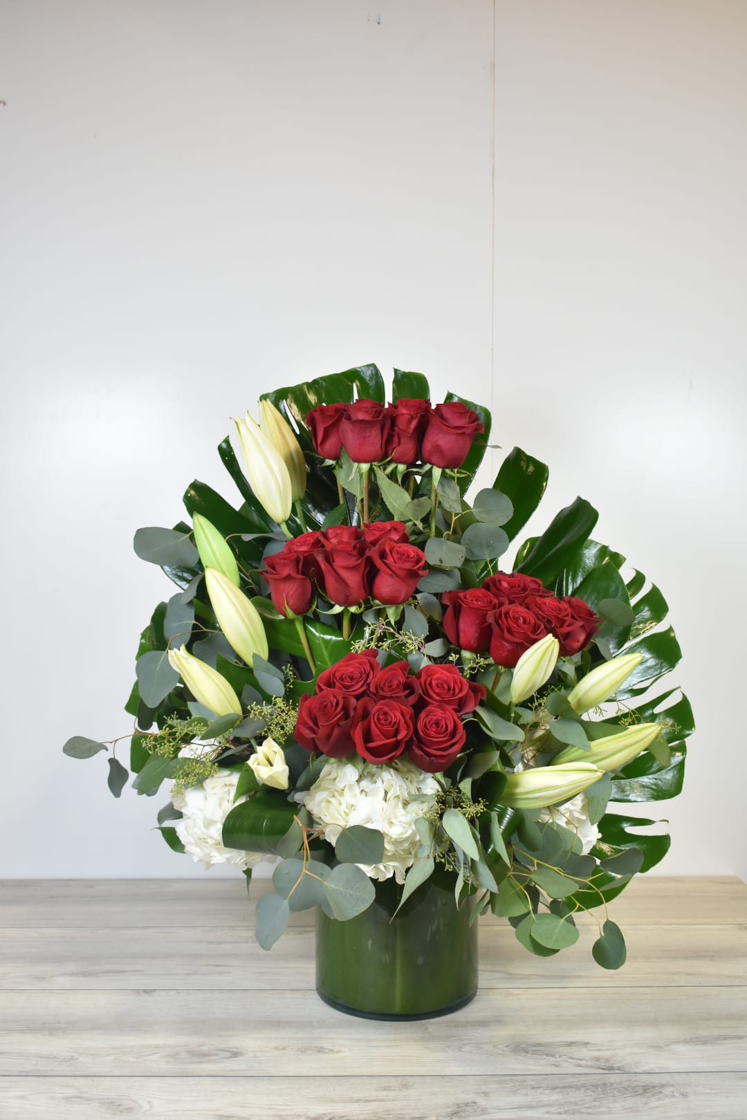 red rose love - 24 beautiful long stem red roses combined with white lilys and white hydrangeas  Perfect for  birthday flowers anniversary flower  just because flowers  congratulations flowers  Get well flowers  Christmas flowers Valentines Day flowers Mother's Day flowers  