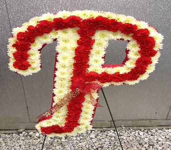 Phillies P - A custom made design of carnations and cushion mums. Requires advance notice to order  