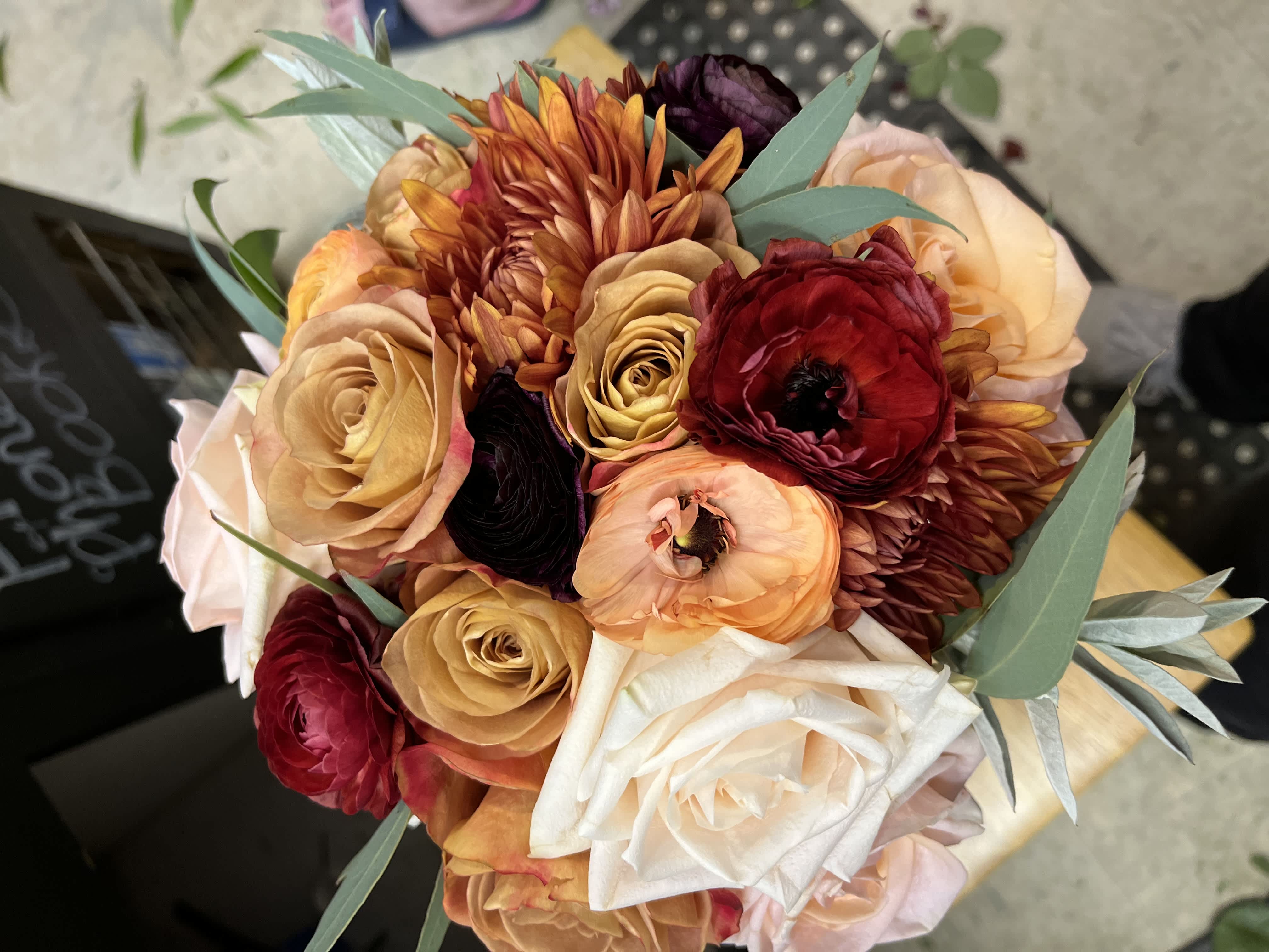 Fall Bridal Bouquet Fall Bridal Bouquet - small bouquet with roses, and other seasonal fall flowers.