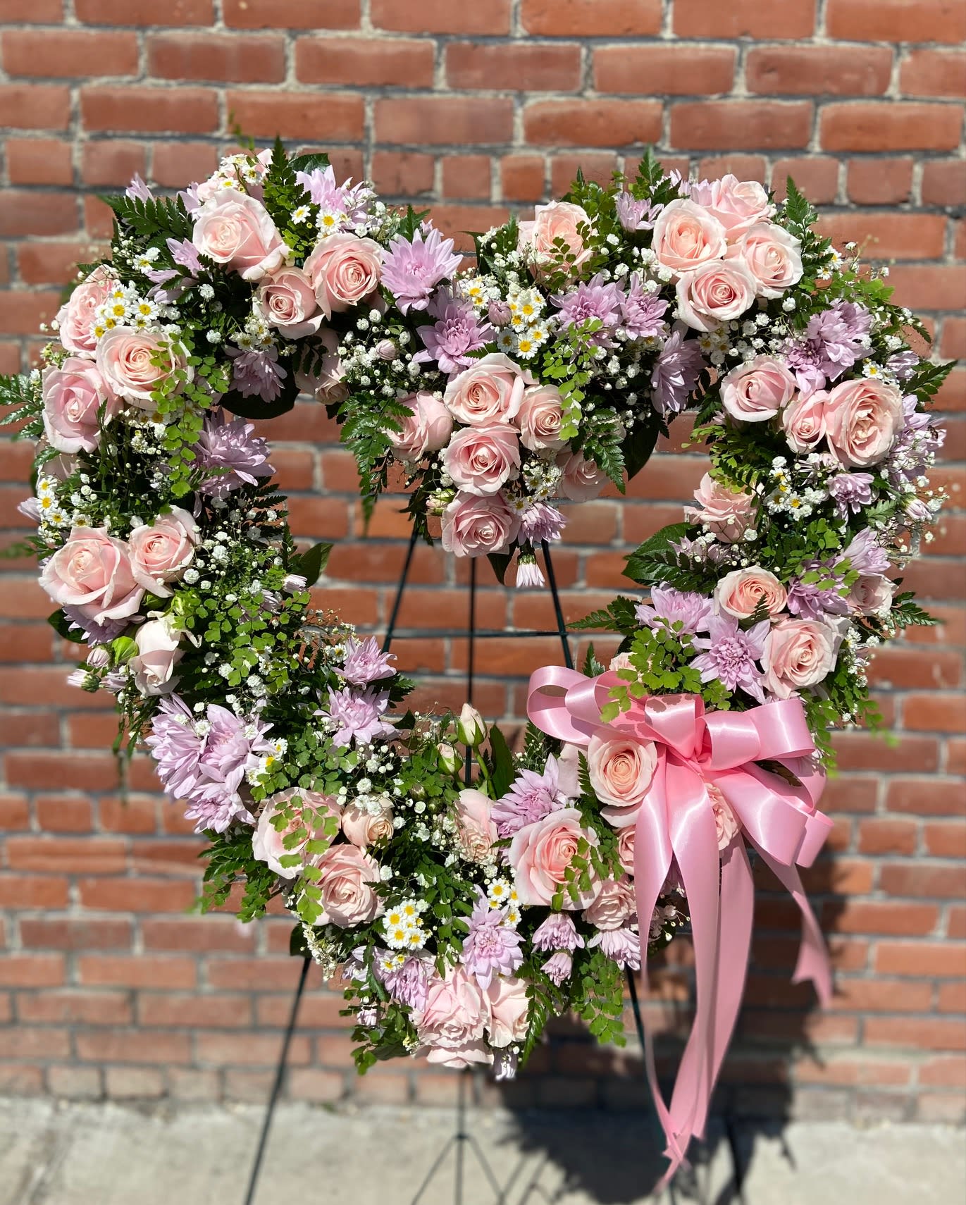 Sweetest Memories Sweetest Memories - Open Heart Wreath for Your Sweetest Memories of Your Loved One. Requests for Different Colors or Flowers Available.
