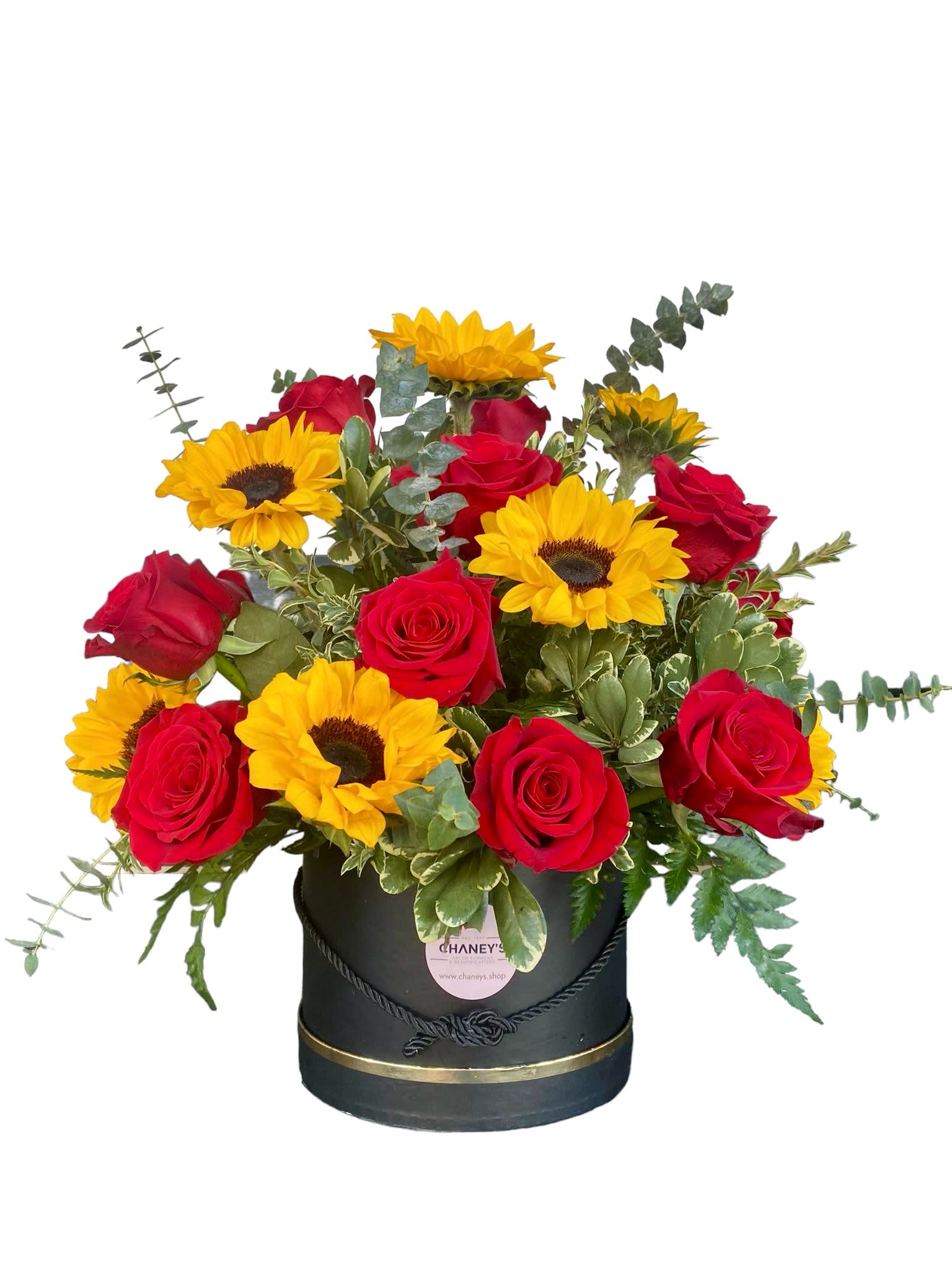 Chaney´s Red Roses and Sunflower Box Chaney´s Red Roses and Sunflower Box - Beautiful red roses meet sunny sunflowers - happy box for happy people!