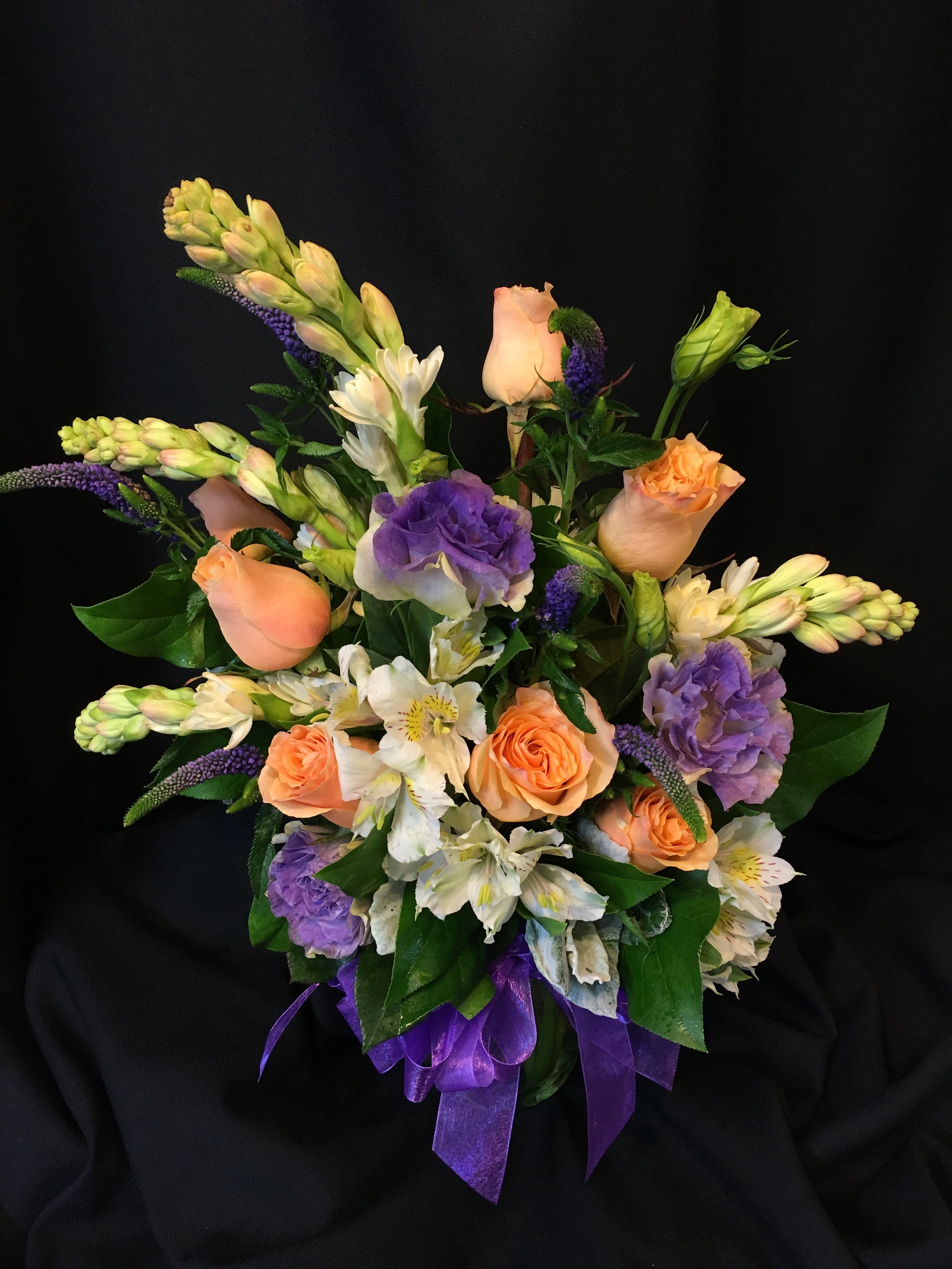 Mixed Bouquet with Roses and Tuberoses Mixed Bouquet with Roses and Tuberoses - Here's a sweet valentine gift full of premium flowers packed in tight for those at work without a lot of space for a large arrangement. It has many endearing classic flowers but is not overpowering or ostentatious in size.