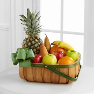Thoughtful Gesture Fruit Basket - Thoughtful Gesture™ Fruit Basket is a gift that offers warmth and comfort to the family and friends of the deceased. A beautiful green rimmed natural woodchip basket accented with a green taffeta ribbon arrives with a collection of everyone's fruit favorites to create a lovely way to offer your deepest condolences.