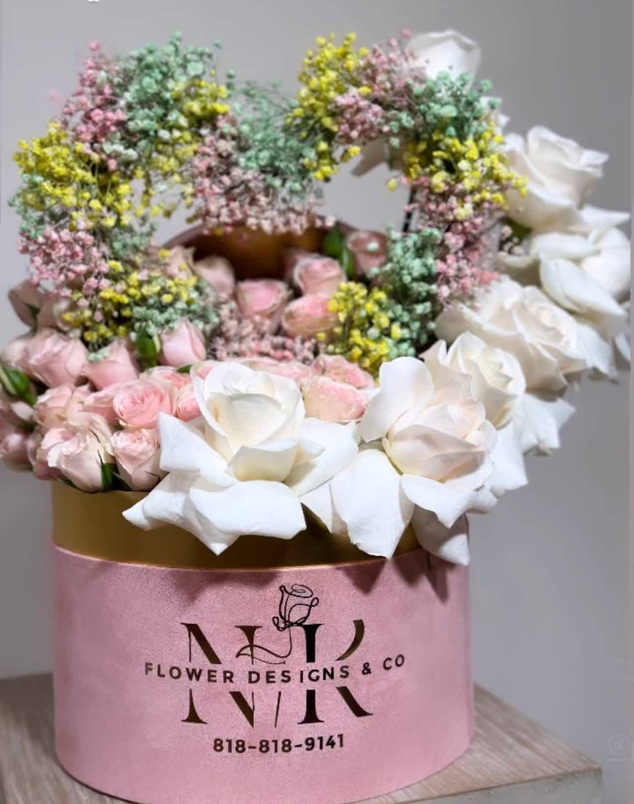 Gentle Love! - Delicate combination of white and pink colors in a velvet pink box, dressed up with a heart made of Baby Breath flowers.  