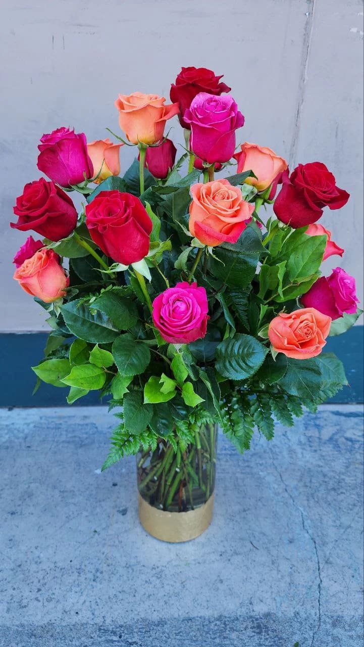 Passion Of Roses  - 8 hot pink roses, 8 orange roses, 8 red roses  tips  leaves in a  tall gold deep vase  