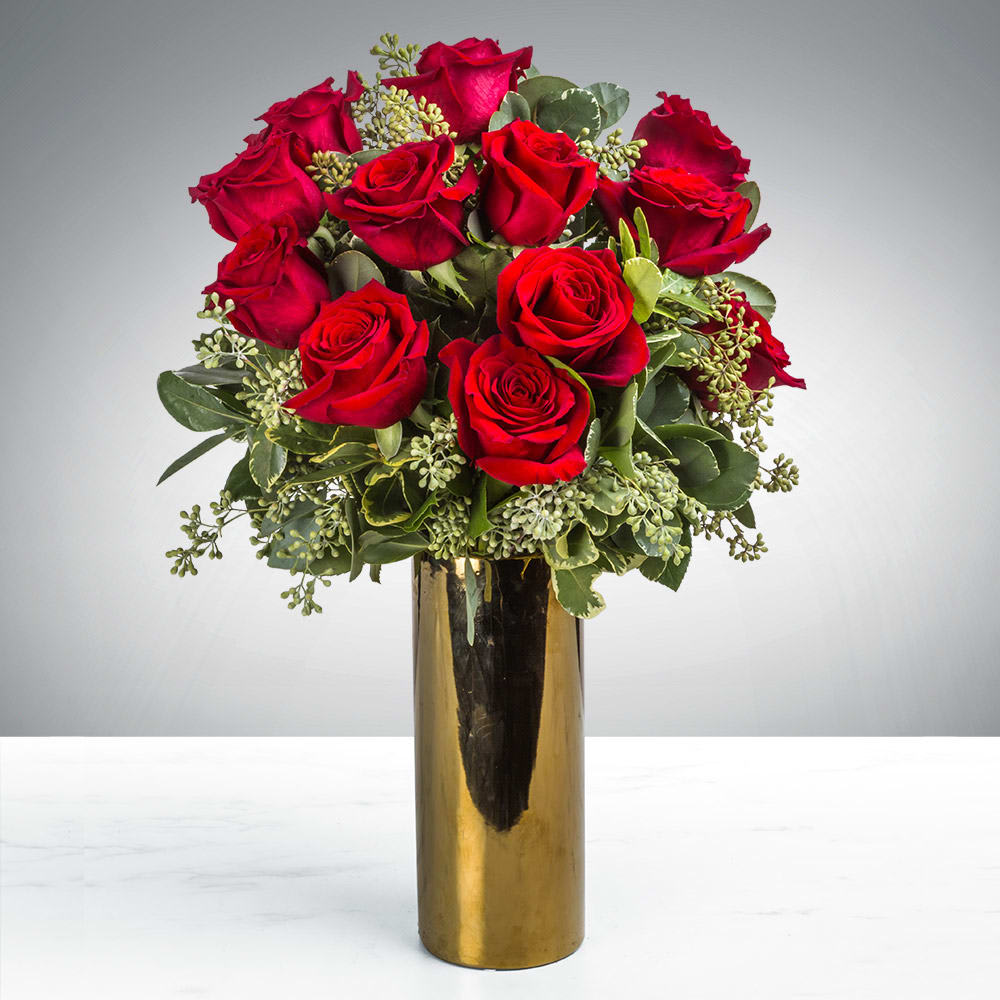In Vogue - Do you love someone who has impeccable taste? Don’t know what to get them? Stay In Vogue with this lovely arrangement. Timeless, beautiful, flawless. Are we describing this arrangement, the recipient, or ourselves? You will never know. Vase color may vary depending on availability 