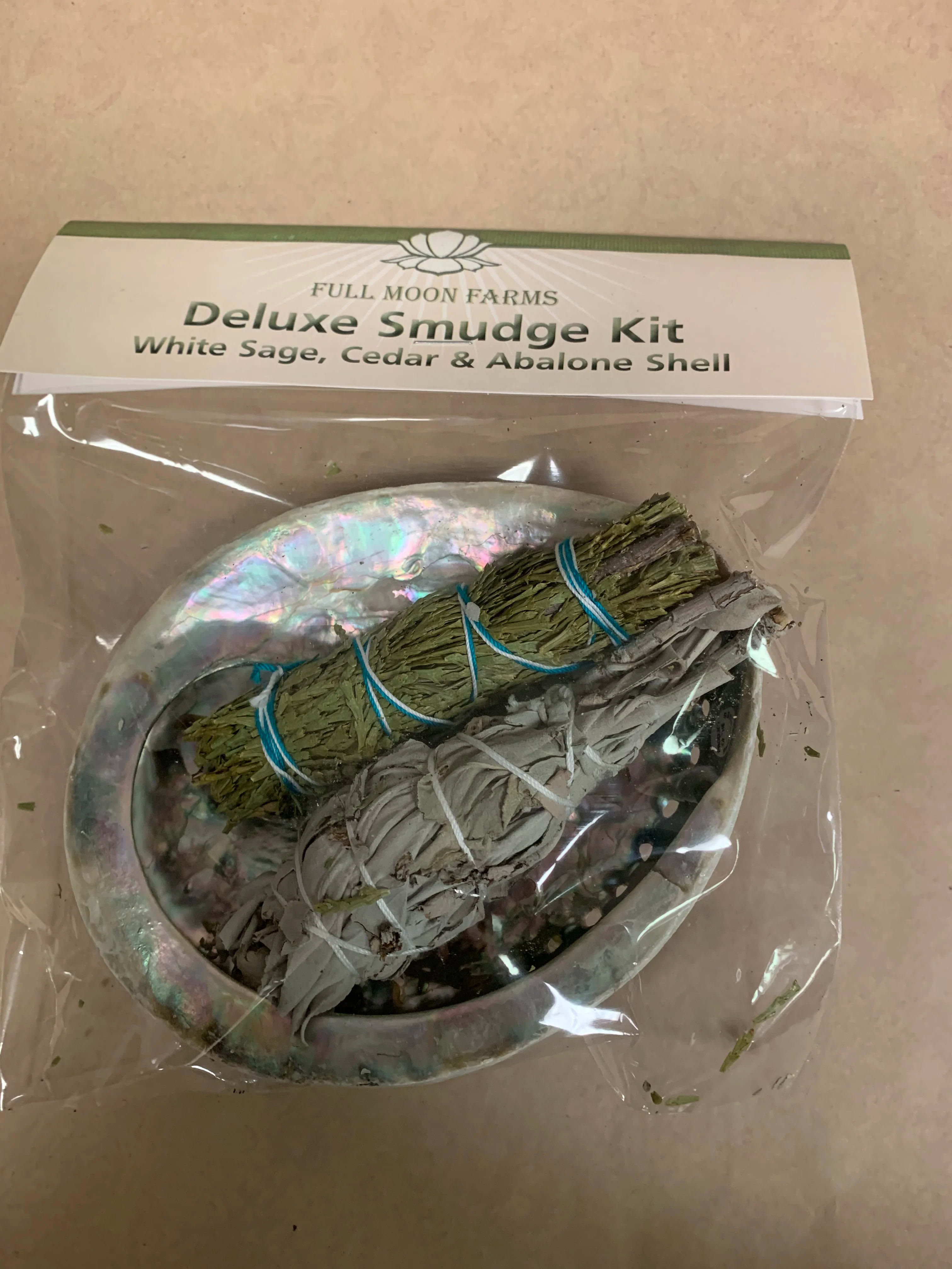 Full Moon Deluxe Smudge Kit - White sage, Cedar &amp; Abalone shell This wonderful Smudge Kit has all you need for your sacred ceremony. Cedar to cleanse a new space or reinforce the protection already in place. White Sage to cleanse and purify your space. The sacred abalone shell to use in your smudging ceremony.