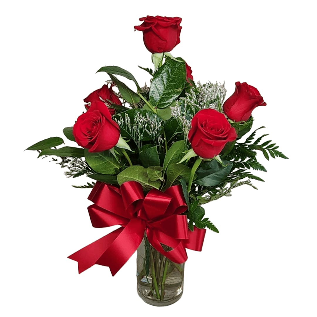 Six Red Roses - Six Red Roses arranged in a vase with Leather Leaf, Limonium, Salal and a red bow.