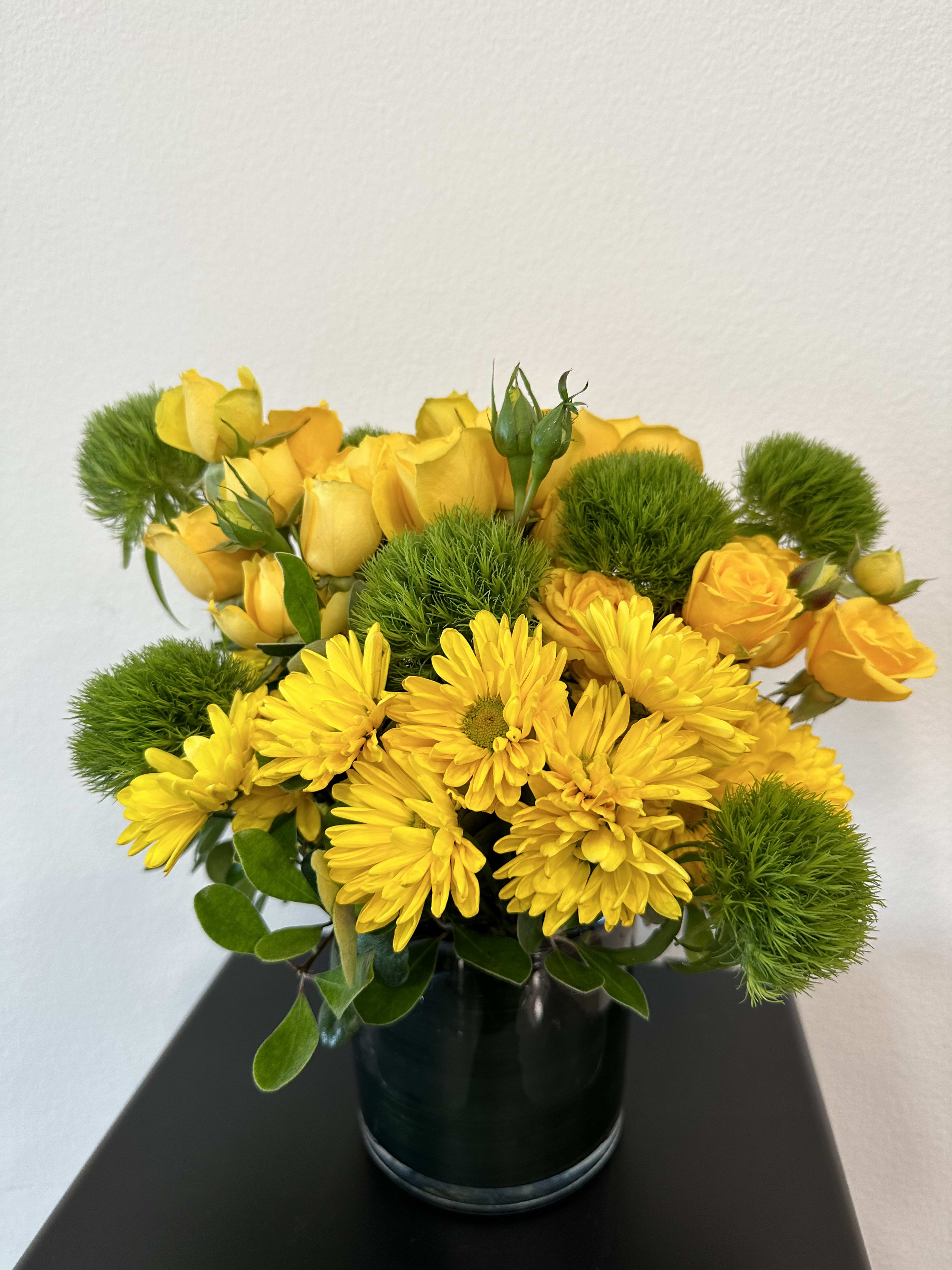Sun kissed - Bright yellow roses, mixed with yellow mums and greenery
