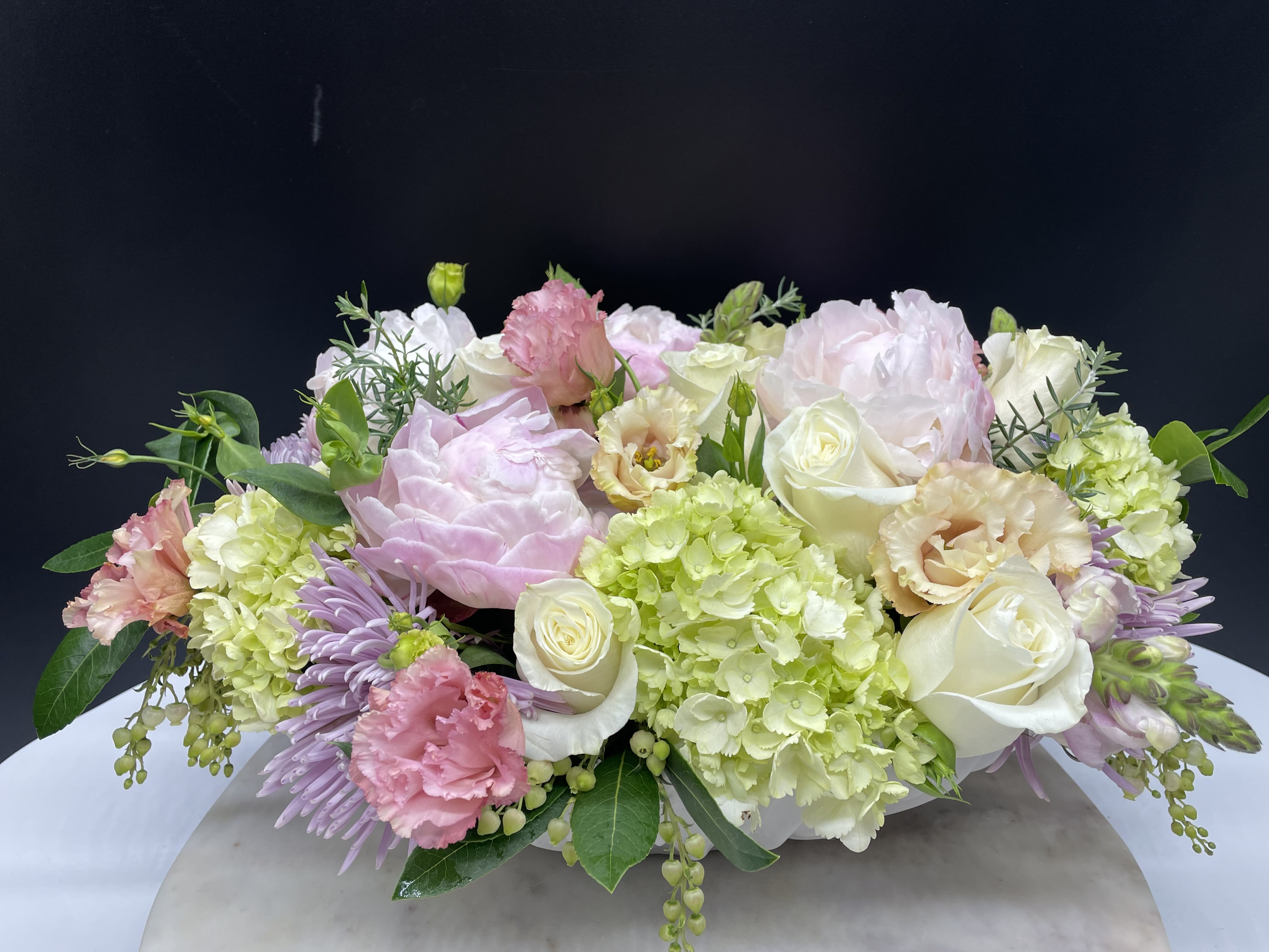 in a nut shell in a nut shell - stunning display of pink peonies, green hydrangeas, white roses, mixed with lavender, chrysanthemum and lisianthus and more