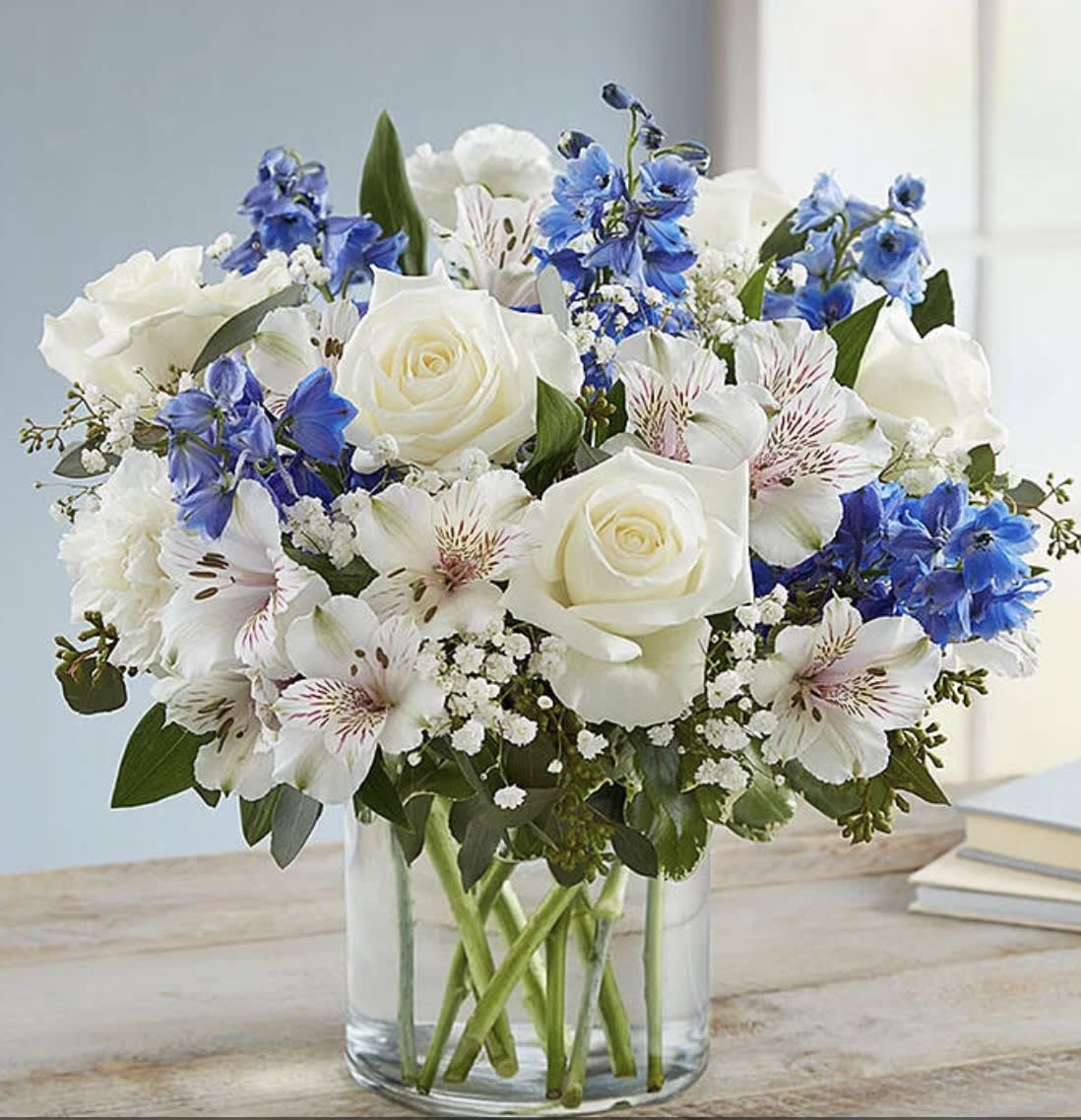 Wonderful Wishes - Our bouquet of blue and white expresses to those who mean the most. It’s a gift that won’t leave them wondering how much you care. 