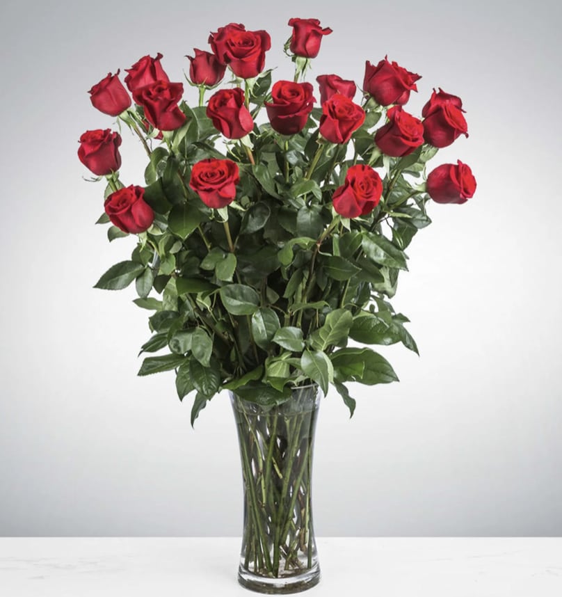Two Dozen Long Stemmed Roses by BloomNation™ - These two dozen red roses provides the classic romantic gift. It's perfect for Valentine's Day or an Anniversary. APPROXIMATE DIMENSIONS: 30&quot; H X 22&quot; W