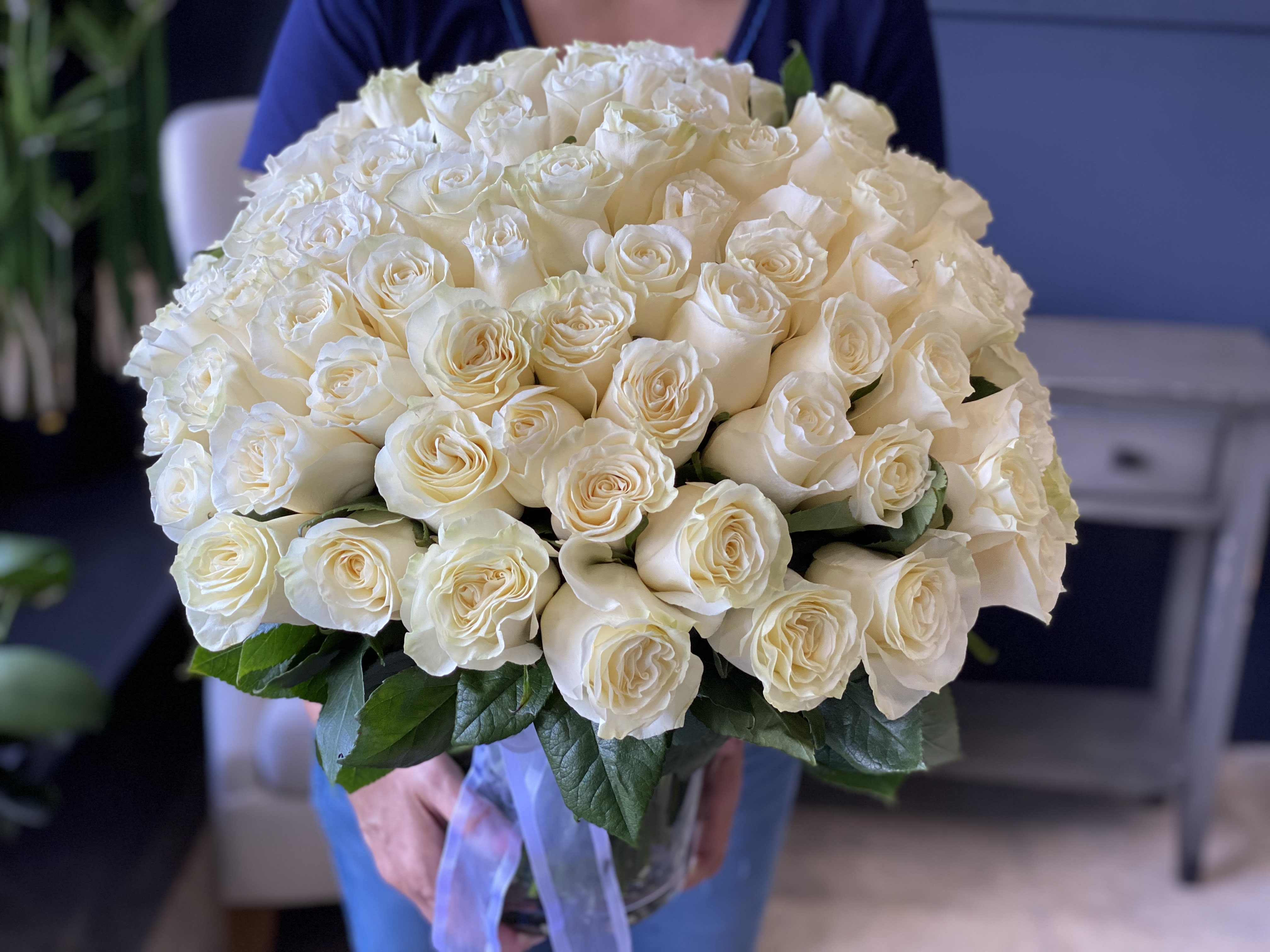 50 white roses arrangement in a vase  - 50 white roses arrangement in a vase 
