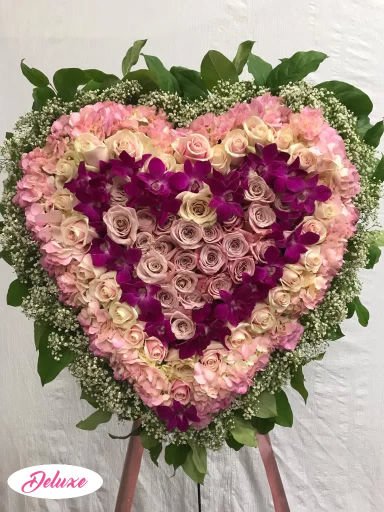 Pink and Purple Heart Pink and Purple Heart - This heart is beautiful. It is a solid heart full of roses, orchids and hydrangea. In soft pinks, lavenders and dark purple it is elegant.