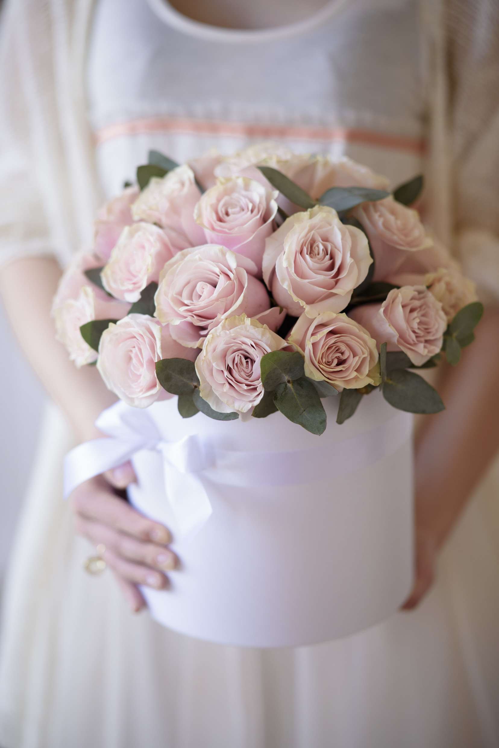 Mabel - Premium, equadorian pale pink roses (up to 30 - medium sized box, up to 50 - large sized box) accented with eucalyptus (Color may vary) Your custom message on our Luxe stationary Hat box size: Medium - D8.5H4.5', Large - D10H6'