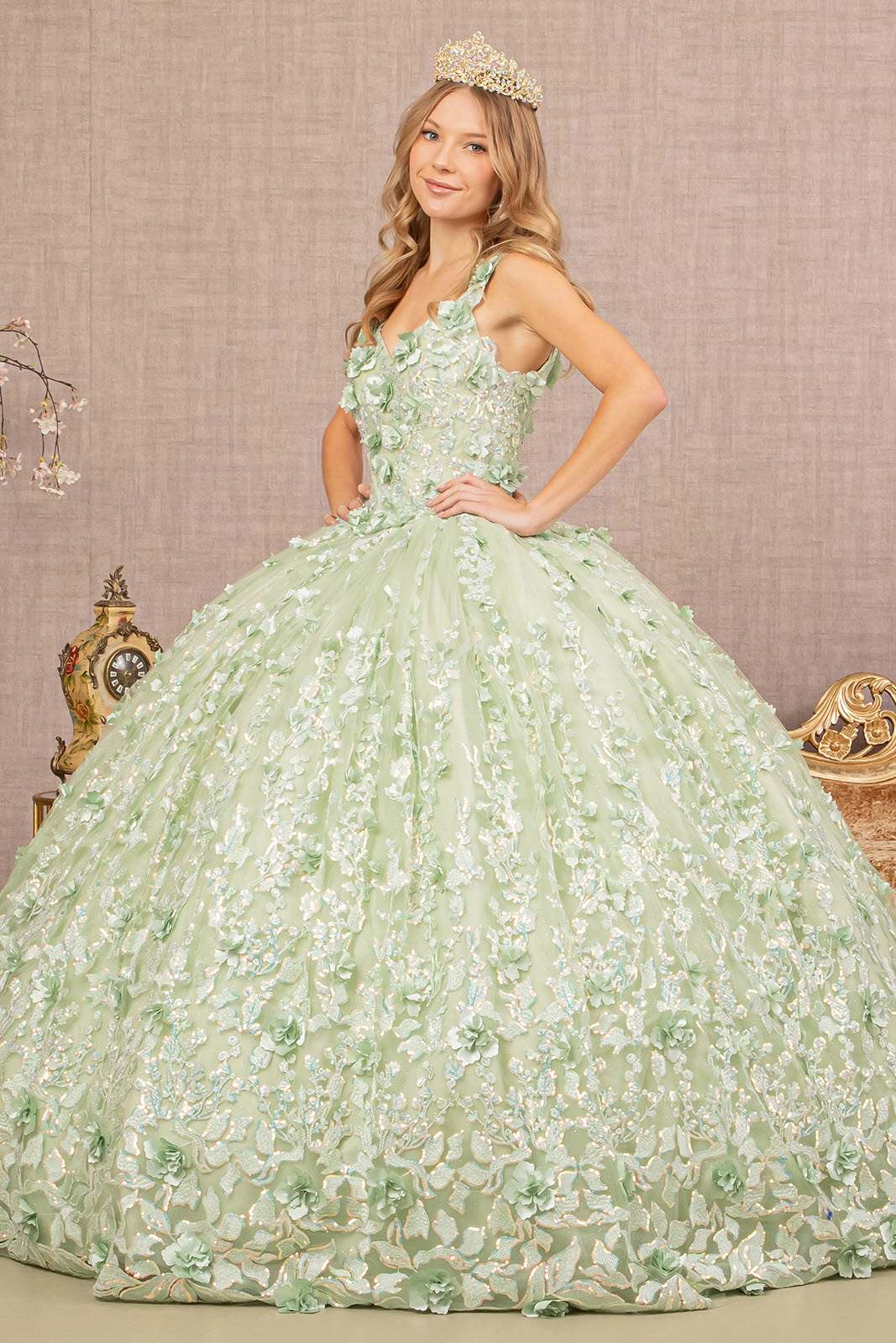 Elizabeth K Sage GL3173 Elizabeth K Sage GL3173 - Jewel Embroidery 3-D Flower Mesh Ball Gown w/ Corset Back This quinceanera ball gown gives you whimsical and polished look all at once. Soft mesh fabric allows you to add intricate embroidery to your dress, and the floral appliques embrace the optical illusion and create 3-D effect. Sparkly jewels and sequin are decorated on the fitted bodice, and shimmering glitter falls all over the dress. Fabric: Mesh Length: Floor Length Neckline: Sweetheart Sleeve: Straps Back: Corset, Open, Zipper Embellishment: Applique, Beads, Embroidery, Glitter, Jewel, Sequin Silhouette: Ball Gown
