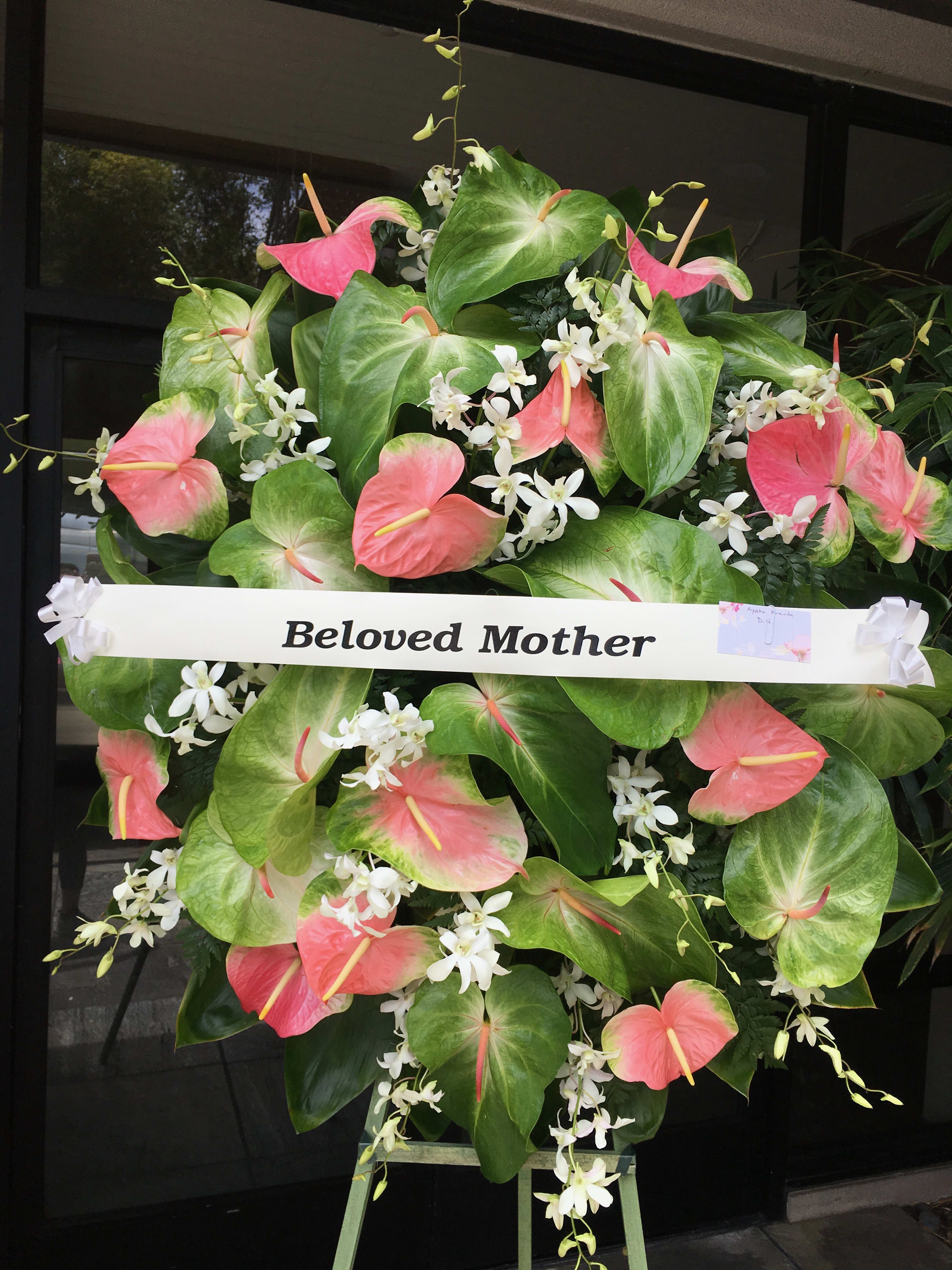 #96 Hint of Pink Spray Wreath by Stanley Ito Florist