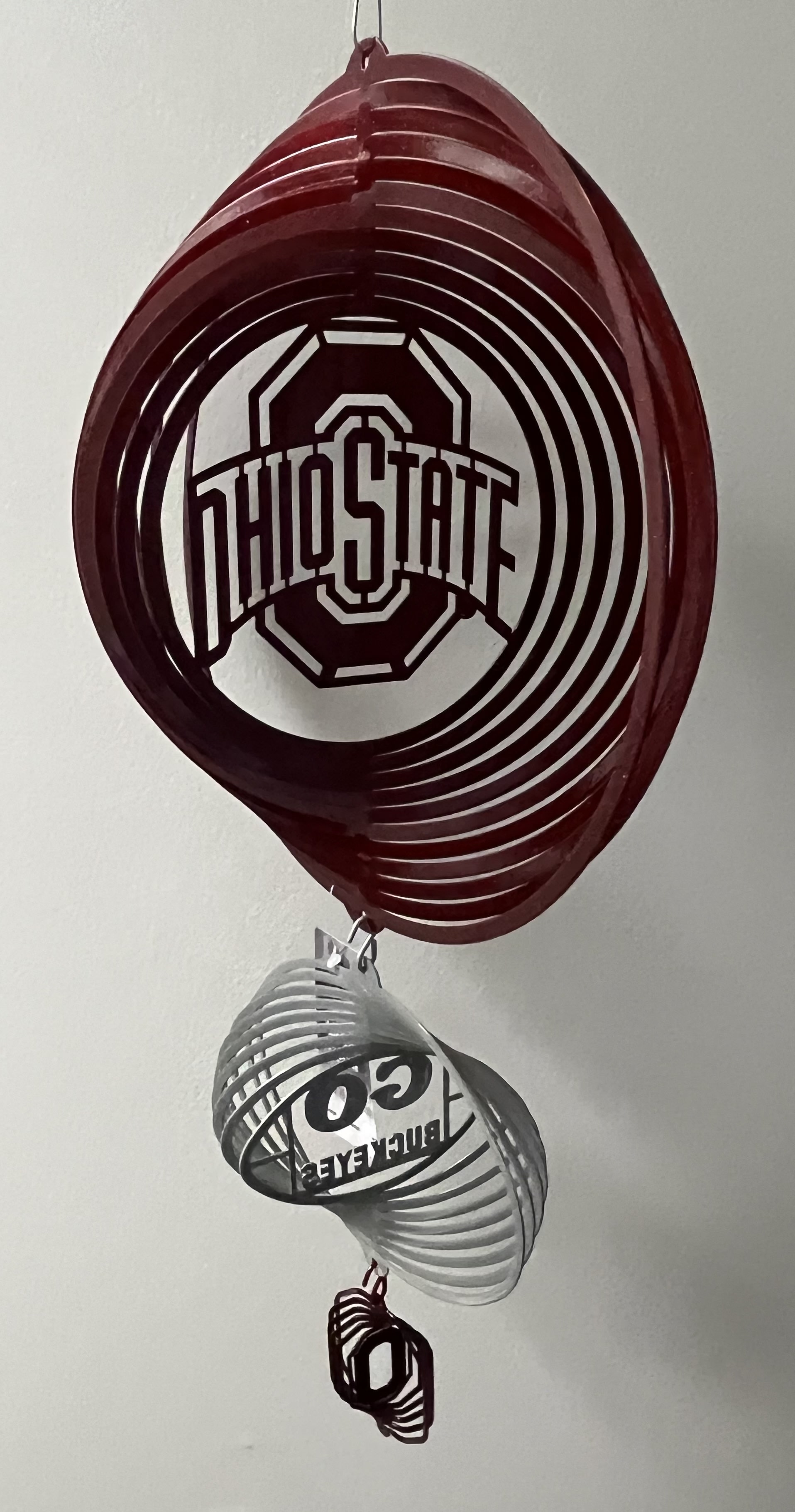 OSU Spinner - 24 in tall made of metal and powdered coated with metallic paint.  Perfect gift for any season or occasion