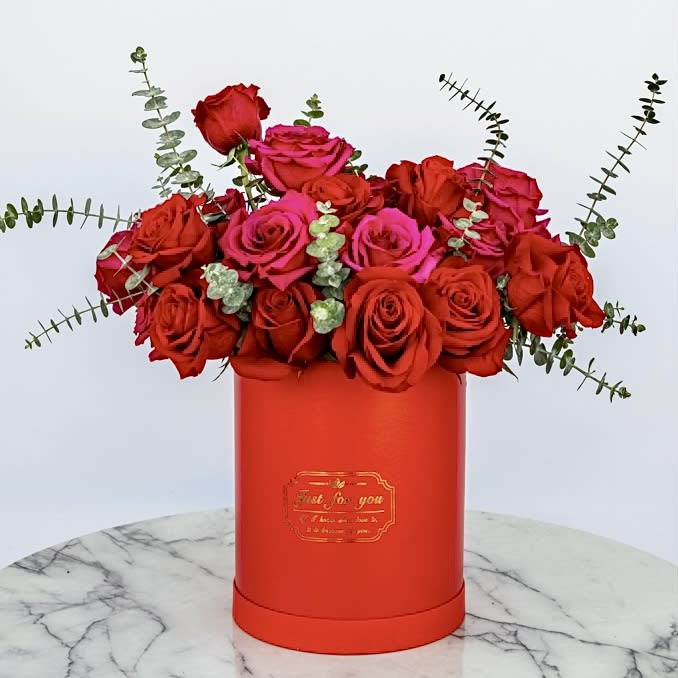 Luxe Roses - Our very best in luxury rose collection, the “Luxe Roses”! The bouquet of all red roses elegantly encased in a sophisticated box where each scarlet blossom is a testament to nature's perfection. Receiving a floral arrangement as exquisite as this is sure to make the woman in your life feel truly cherished and exceptionally special.   Approximately 18” D