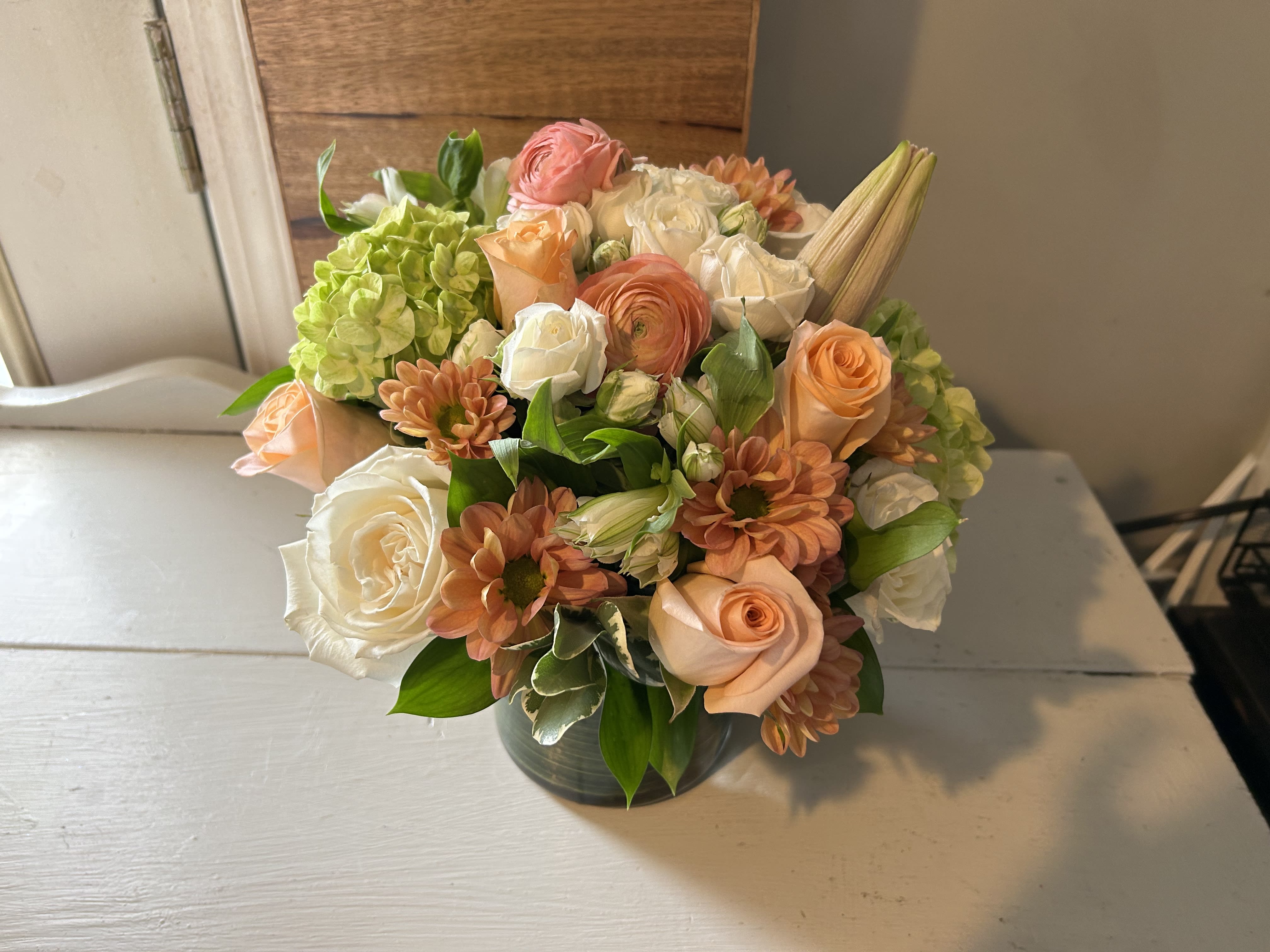 A peach for my peach! - A lovely assortment of peach and cream roses, ranunculus, spray roses and more.A new addition for the summer of 2023! 