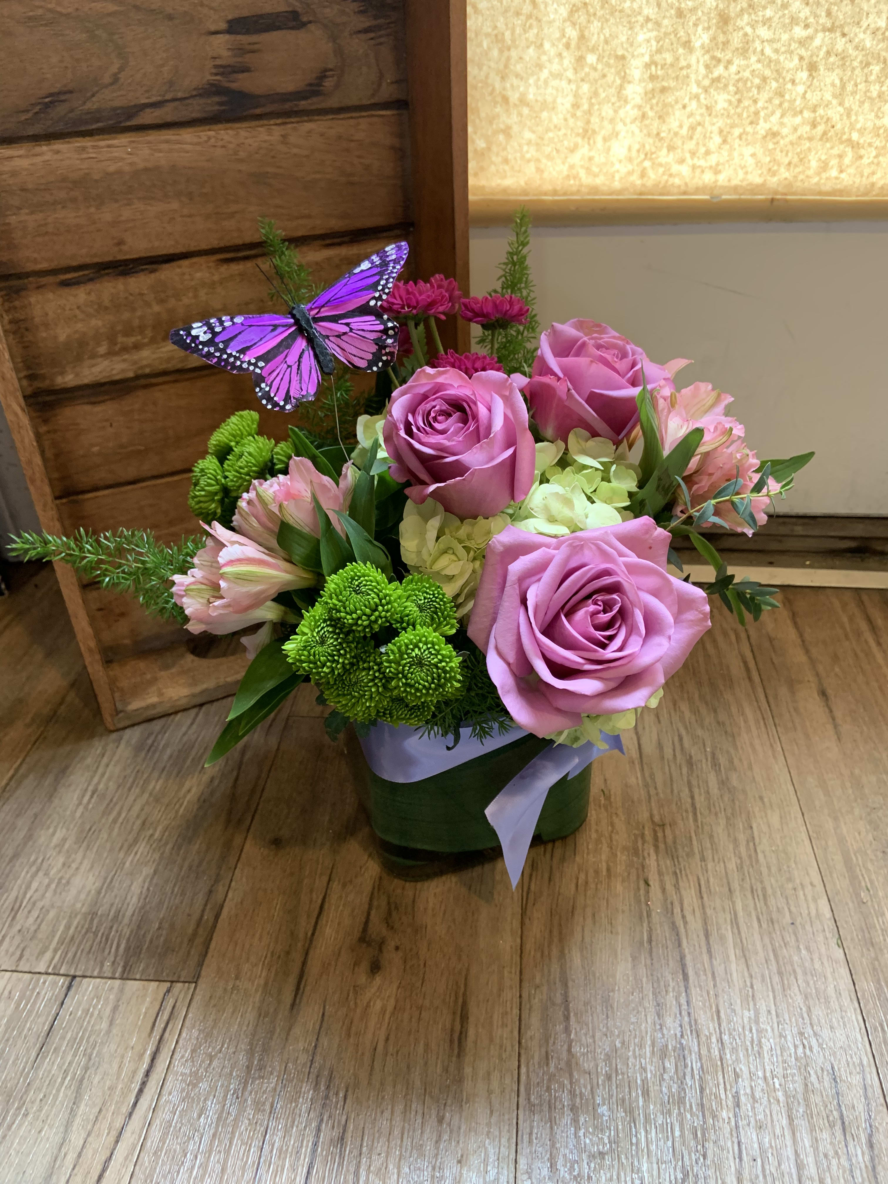 Sweet Lavender  - Roses, hydrangea and daises in leaf lined glass cube. A sweet design to convey your sentiments. This is one of our most popular designs! 