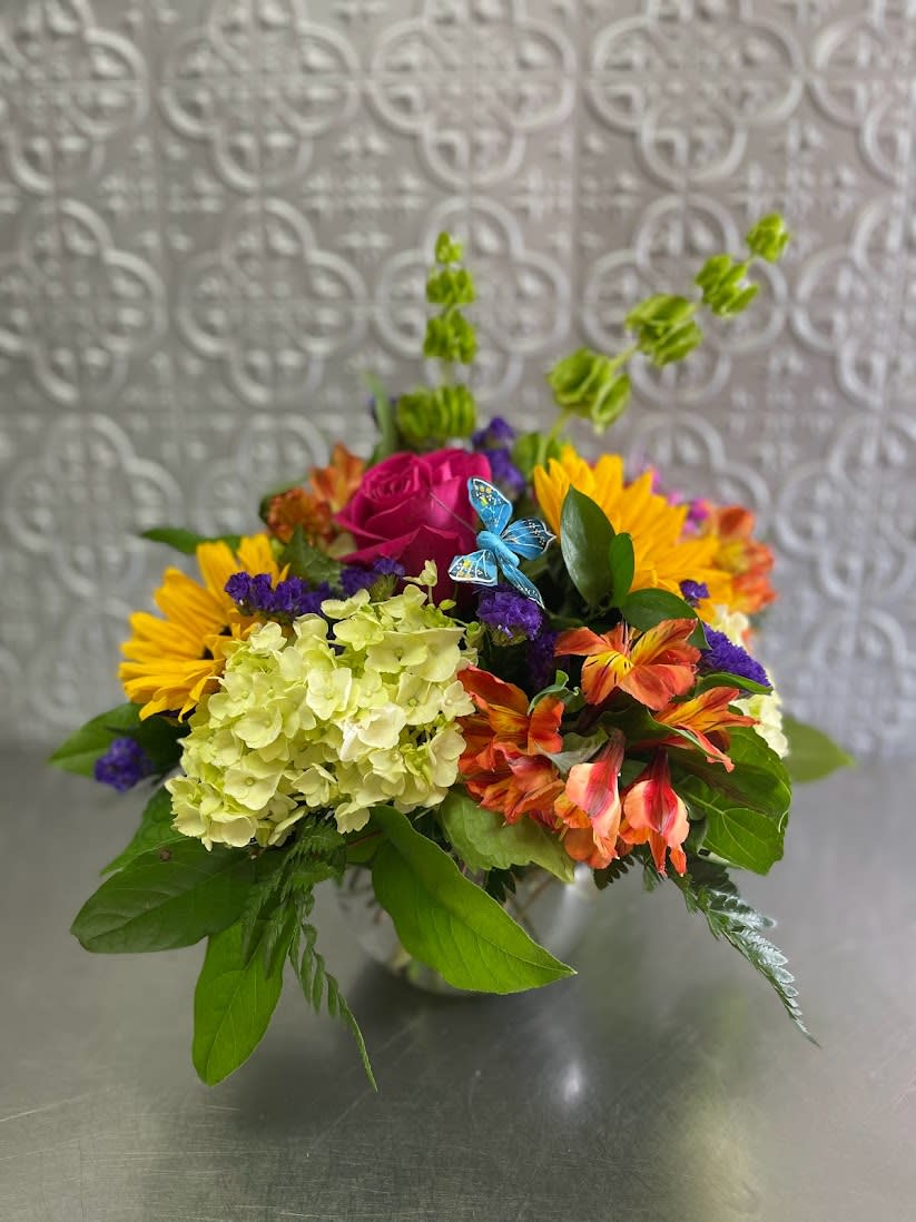 Dream Garden  - A mix colorful arrangement that will a small touch of a floral garden to get a smile out from some one special.