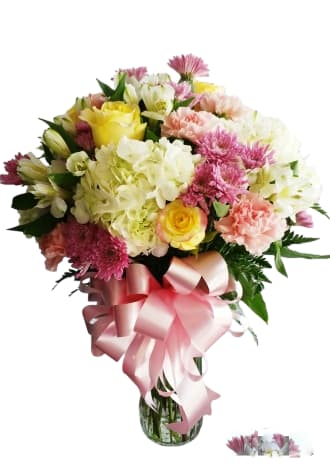 Seasonal Mixed Premium Spring FS4 - A lovely mix of pretty pastels and accented with a bow.