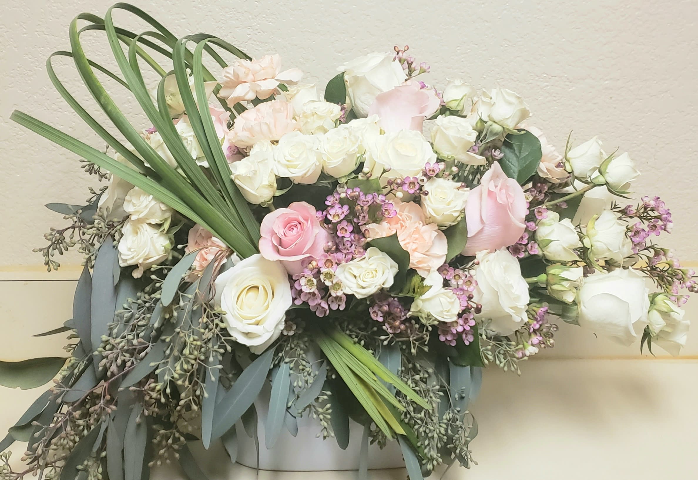 Valentine Wonder  - Spray roses, Mix of lush roses, wax and seeded Eucalyptus, great for any occasion. 