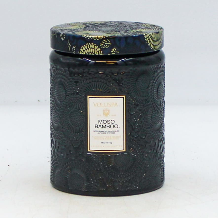 VOLUSPA Moso Bamboo - DESCRIPTION  Notes of Moso Bamboo, Black Musk &amp; Japanese Cypress. Fragrance Description Roam a woodland trail and light a path to the forest, where the scent of the great outdoors thrives with huckleberry vines amid tall Japanese cypress boughs. Lush, green thickets flourish in fertile, dark, musky soil, while fresh bamboo saplings blend with strong, tall reeds, interwoven with greenery. Enter your secret tree house and breathe in.