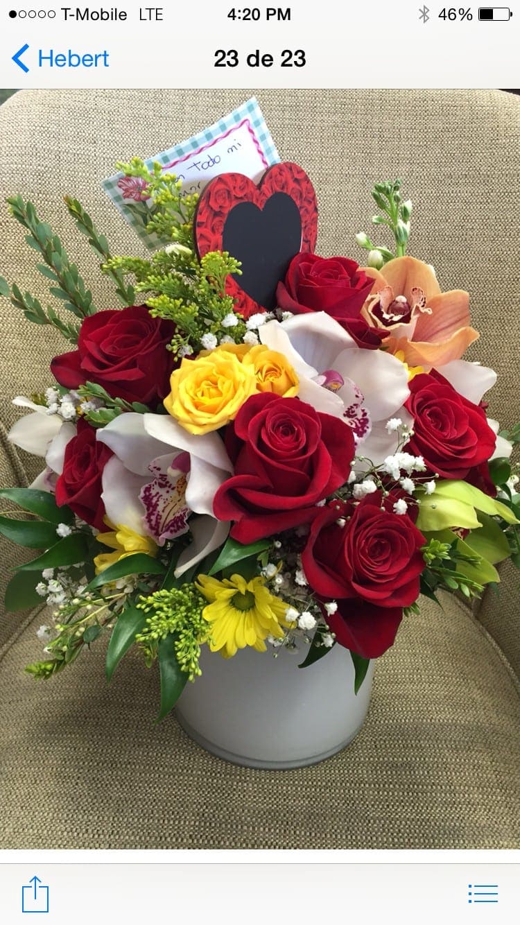 MIX OF LOVE MIX OF LOVE - A BEAUTIFUL MIX OF PREMIUM FLOWERS, LUXURY GIFT IN ANY MOMENT. 2 CYMBIDIUM IN A BEAUTIFUL MIX WITH ROSES AND GREENS Flowers and similar colors