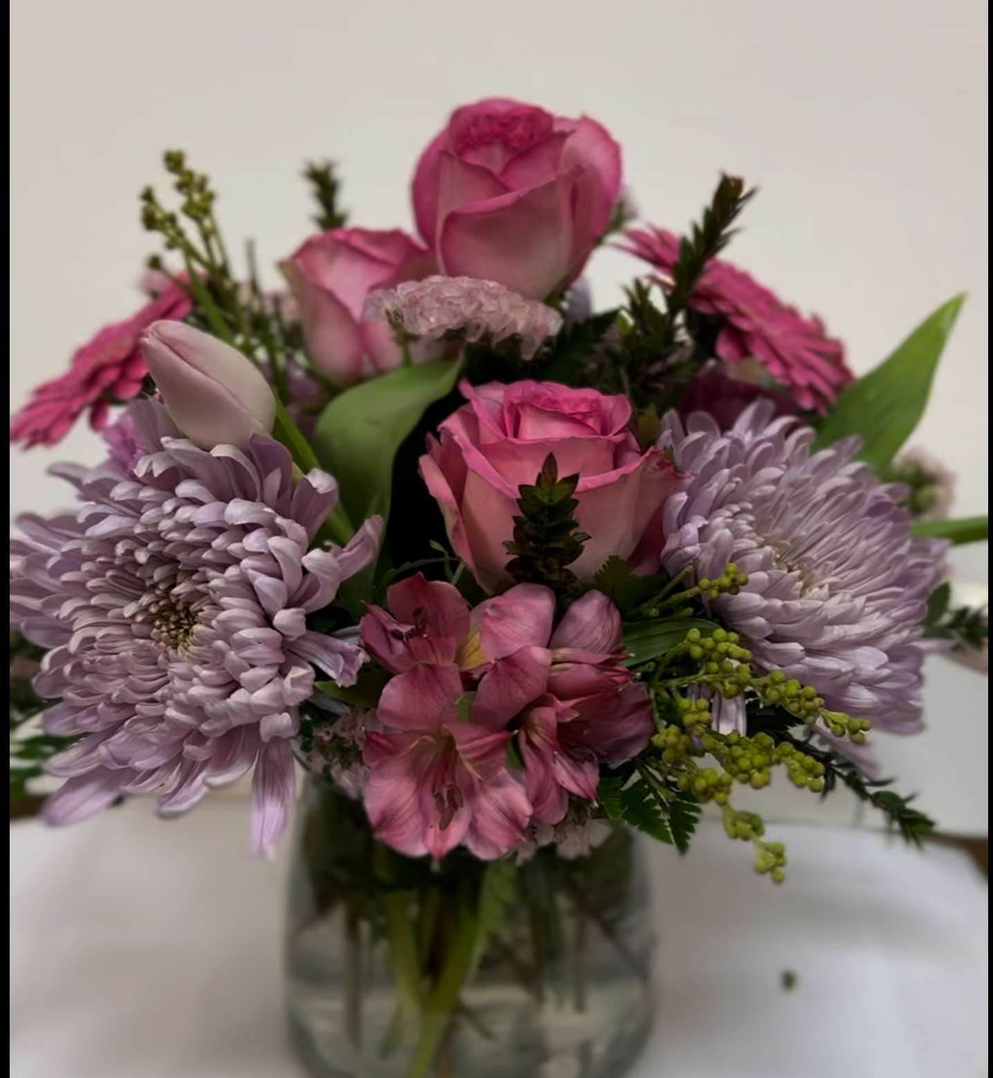 Maggie’s Favorite - Seasonal fresh florals , vased in shades of pinks and lavenders